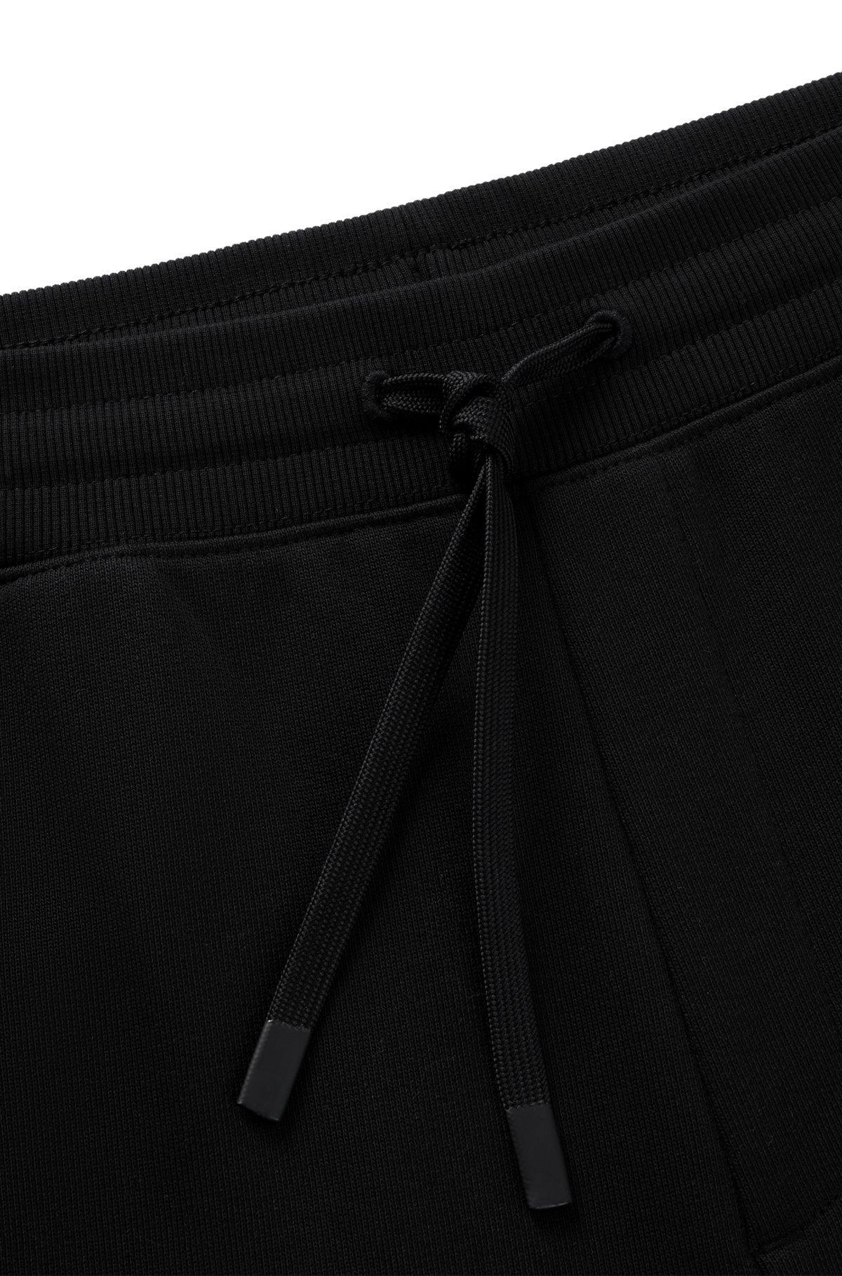Cotton-terry tracksuit bottoms with logo print Product Image