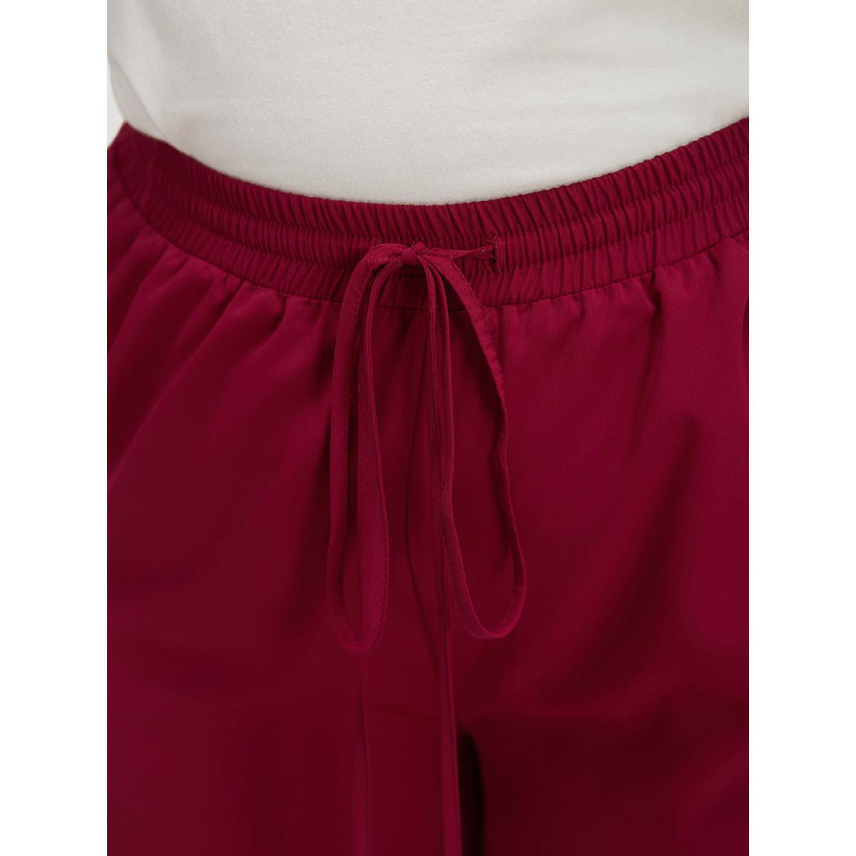 Plus Size Solid Pocket Drawstring Wide Leg Pants Women Burgundy Office Wide Leg High Rise Work Pants BloomChic 22-24/3X Product Image