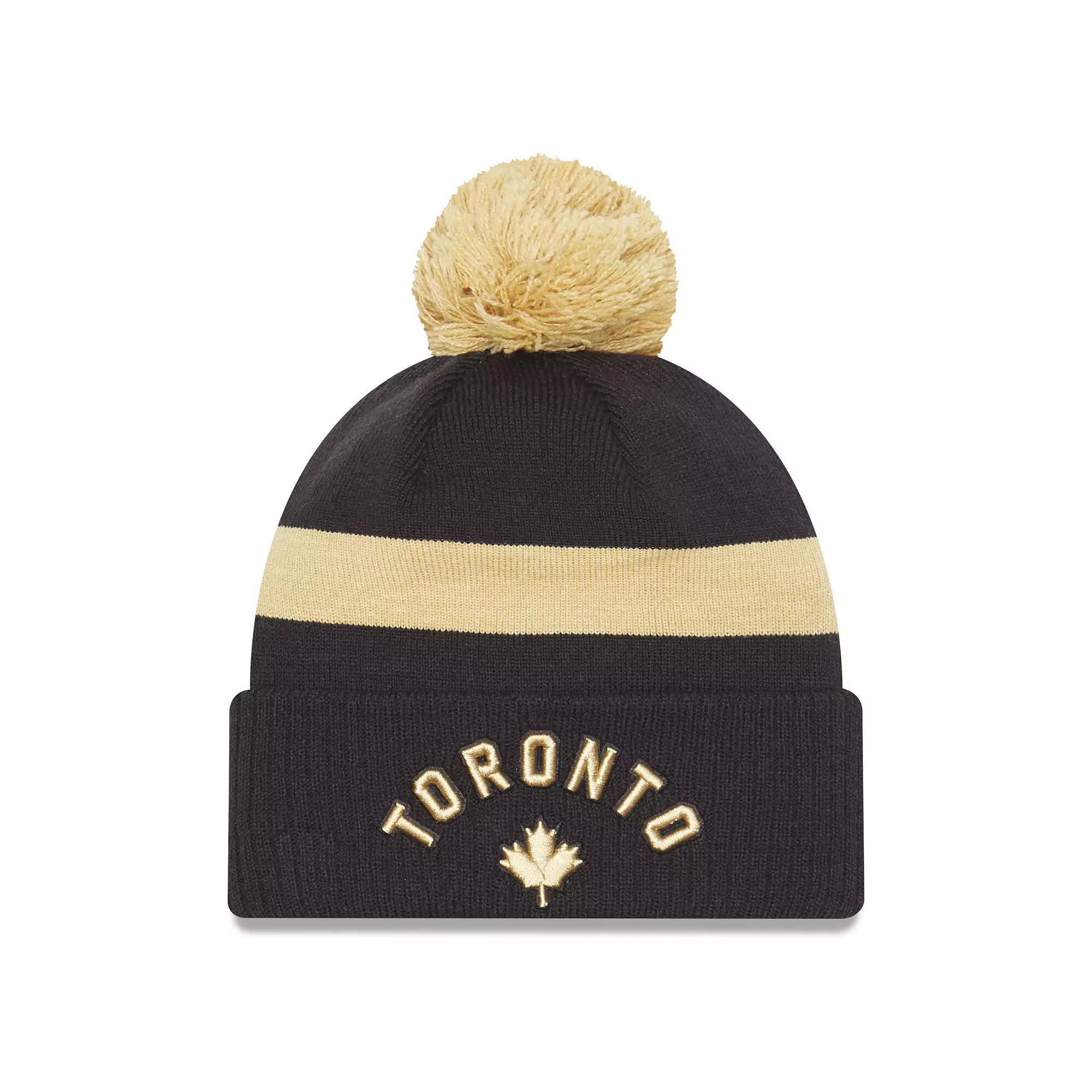 Men's New Era  Black Toronto Raptors 2022/23 City Edition Official Cuffed Pom Knit Hat, Rpt Blue Product Image