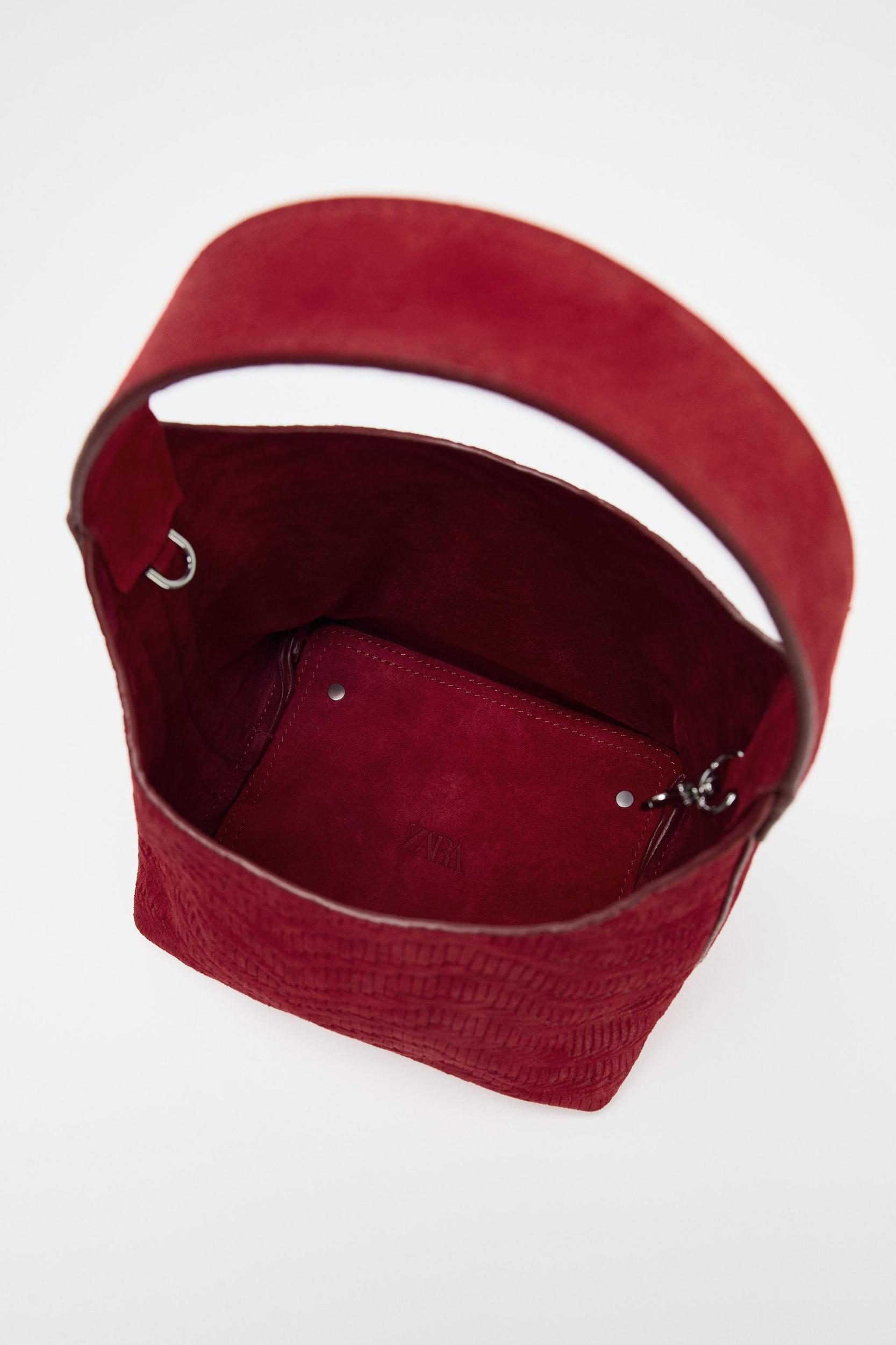 BRAIDED SPLIT LEATHER MINI BUCKET BAG Product Image
