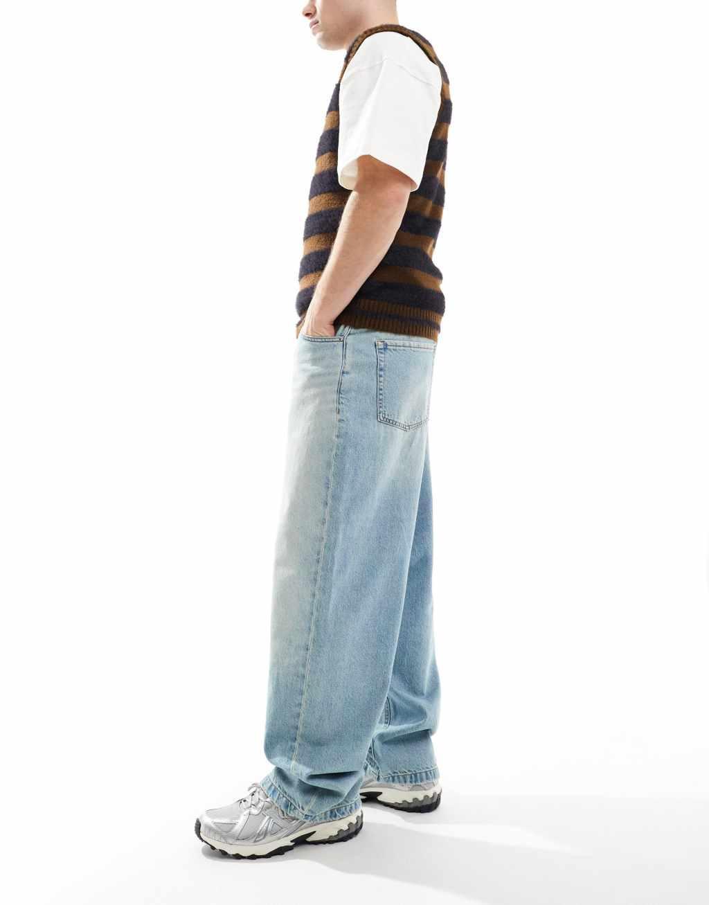 ASOS DESIGN baggy fit jeans in light wash blue Product Image