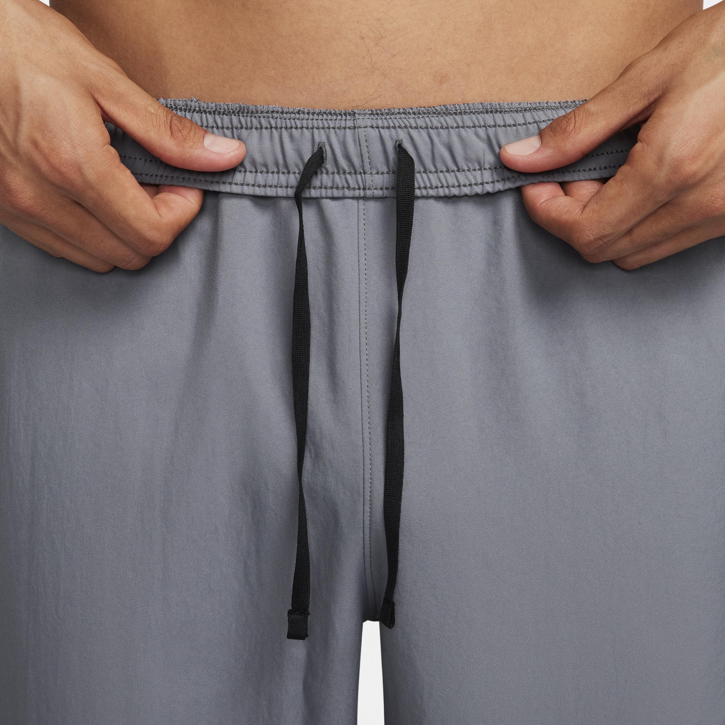 Nike Men's Challenger Dri-FIT Woven Running Pants in Grey/Smoke Grey Size Medium Polyester Product Image
