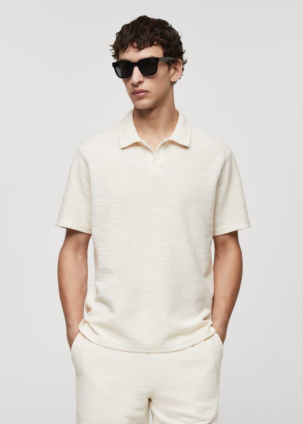 Regular-fit textured knitted polo shirt - Men | MANGO USA Product Image