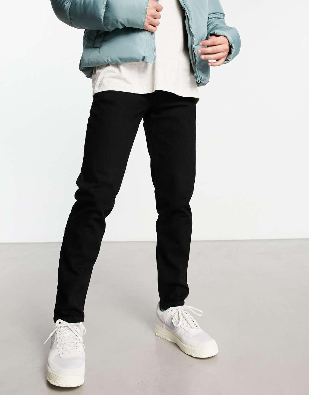 ASOS DESIGN tapered jeans in black Product Image