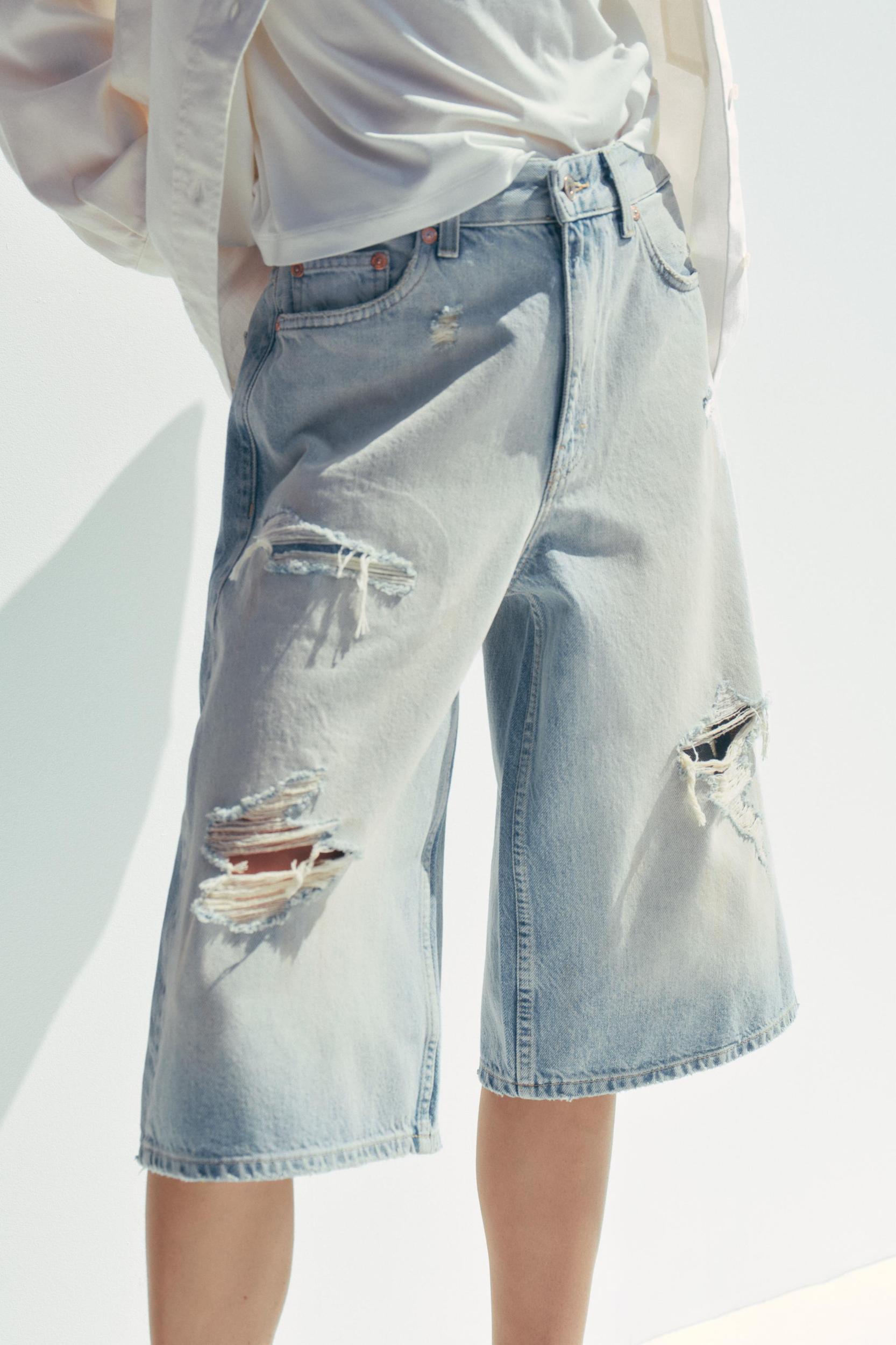 MID-RISE RIPPED DENIM BERMUDA JORTS Product Image