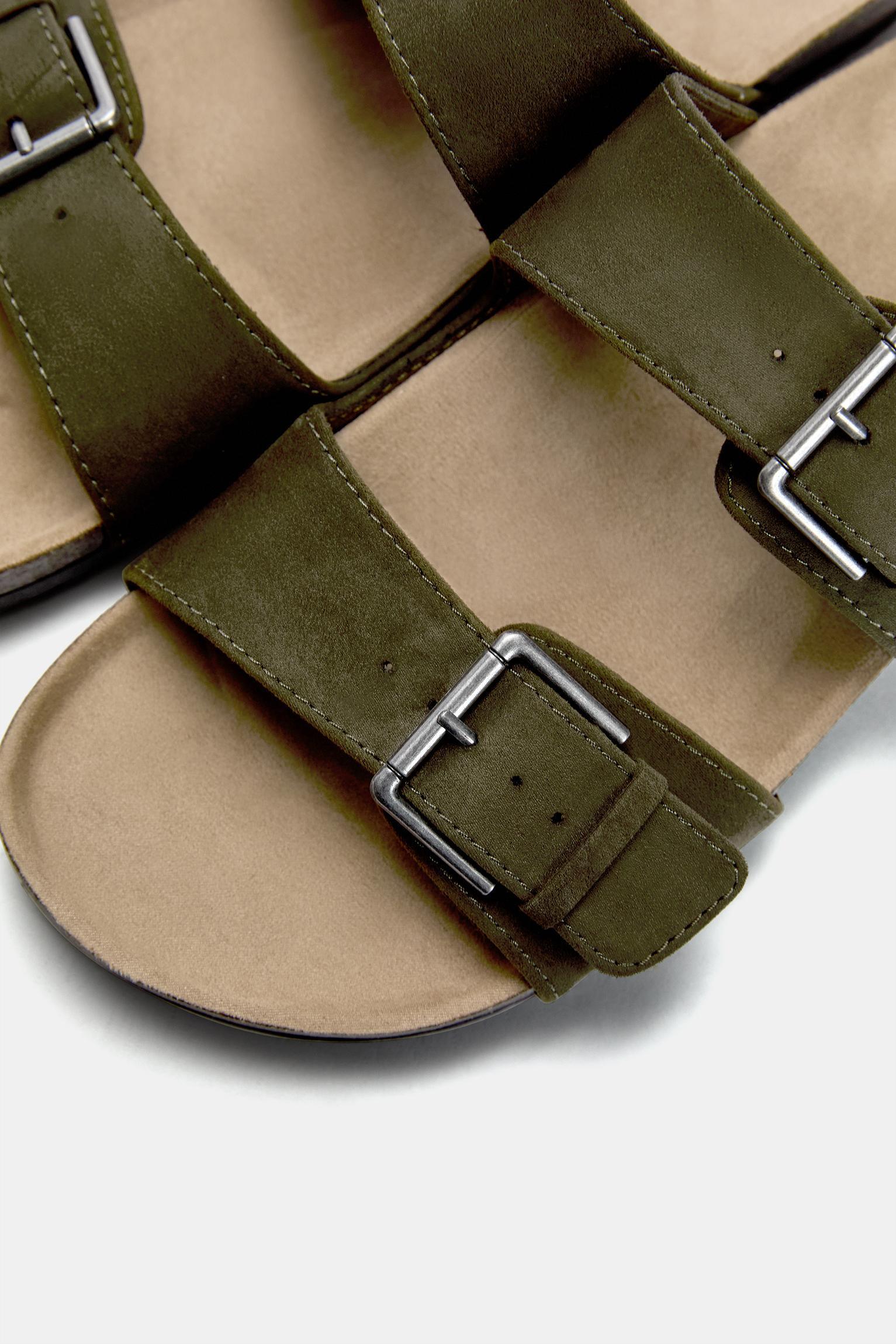 Flat sandals with buckles Product Image