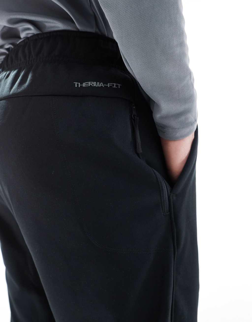 Nike Training Therma-Fit sweatpants in black Product Image