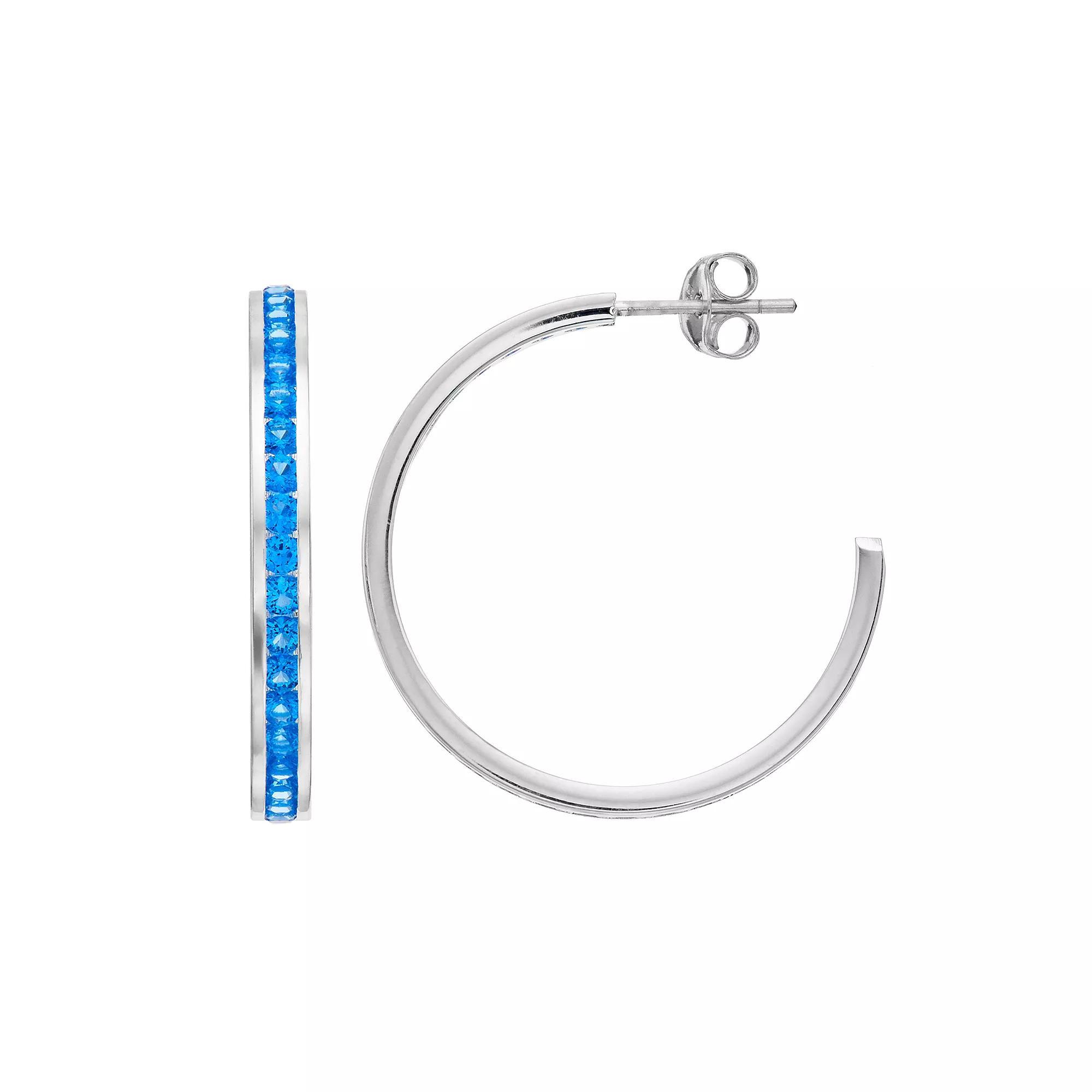Traditions Jewelry Company Sterling Silver Channel-Set Blue Topaz Birthstone Hoop Earrings, Womens Product Image