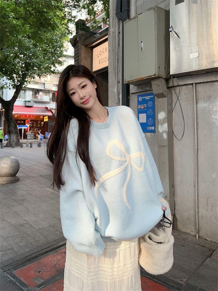 Round Neck Bow Print Oversized Sweater / Mid Rise Plain Ruffle Trim Maxi Skirt / Mid Rise Plain Wide Leg Pants Product Image