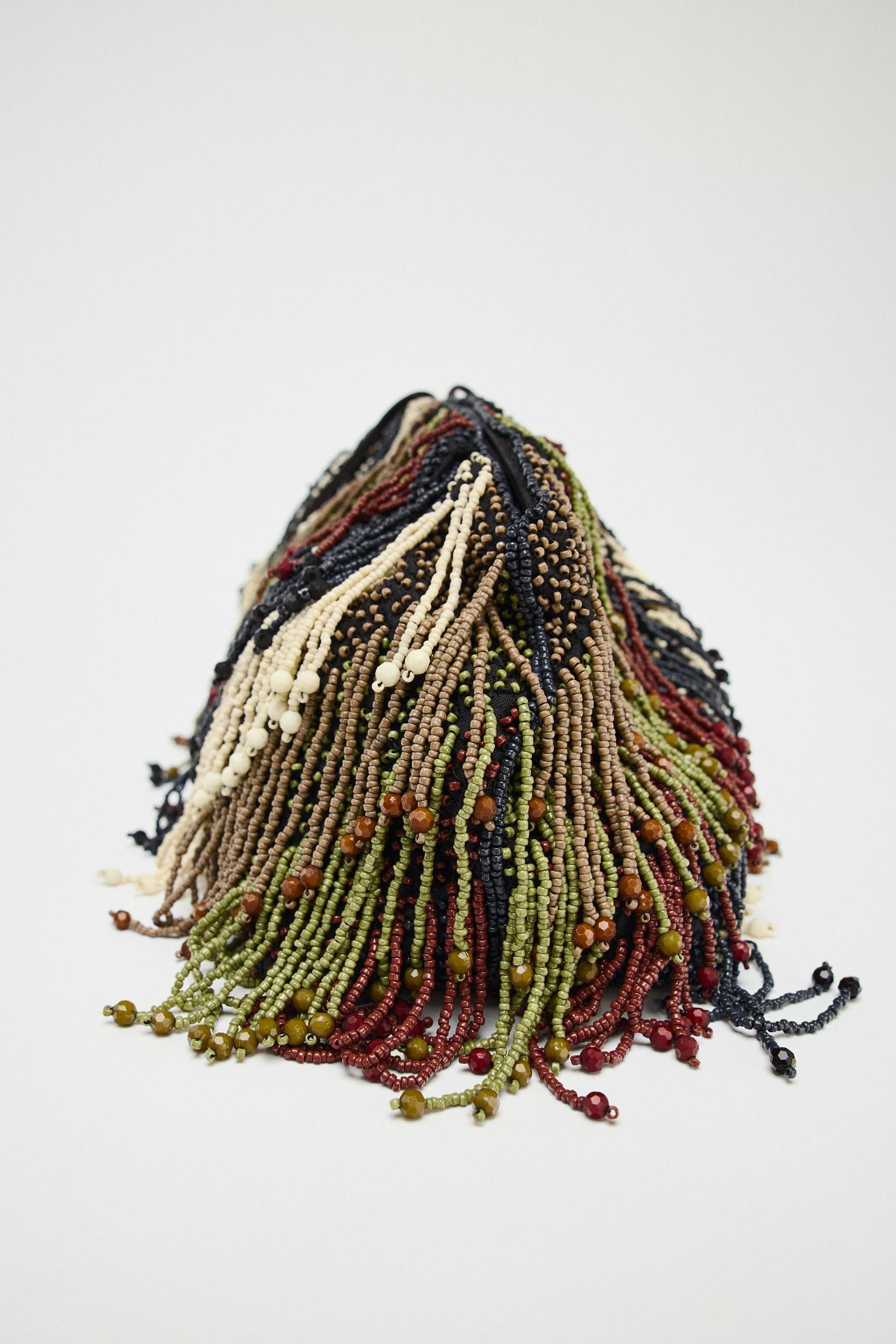 SEQUINED FRINGE CLUTCH Product Image