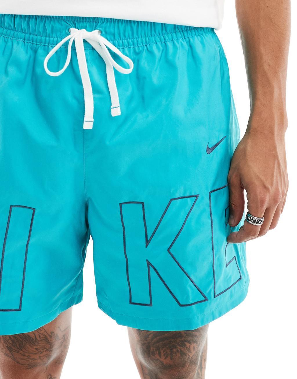 Nike Club woven logo printed shorts in aqua Product Image