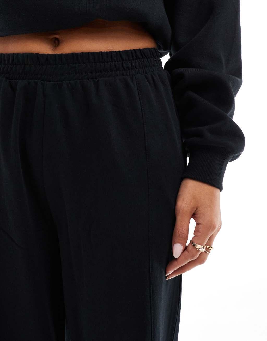 ASOS DESIGN straight leg sweatpants in black Product Image