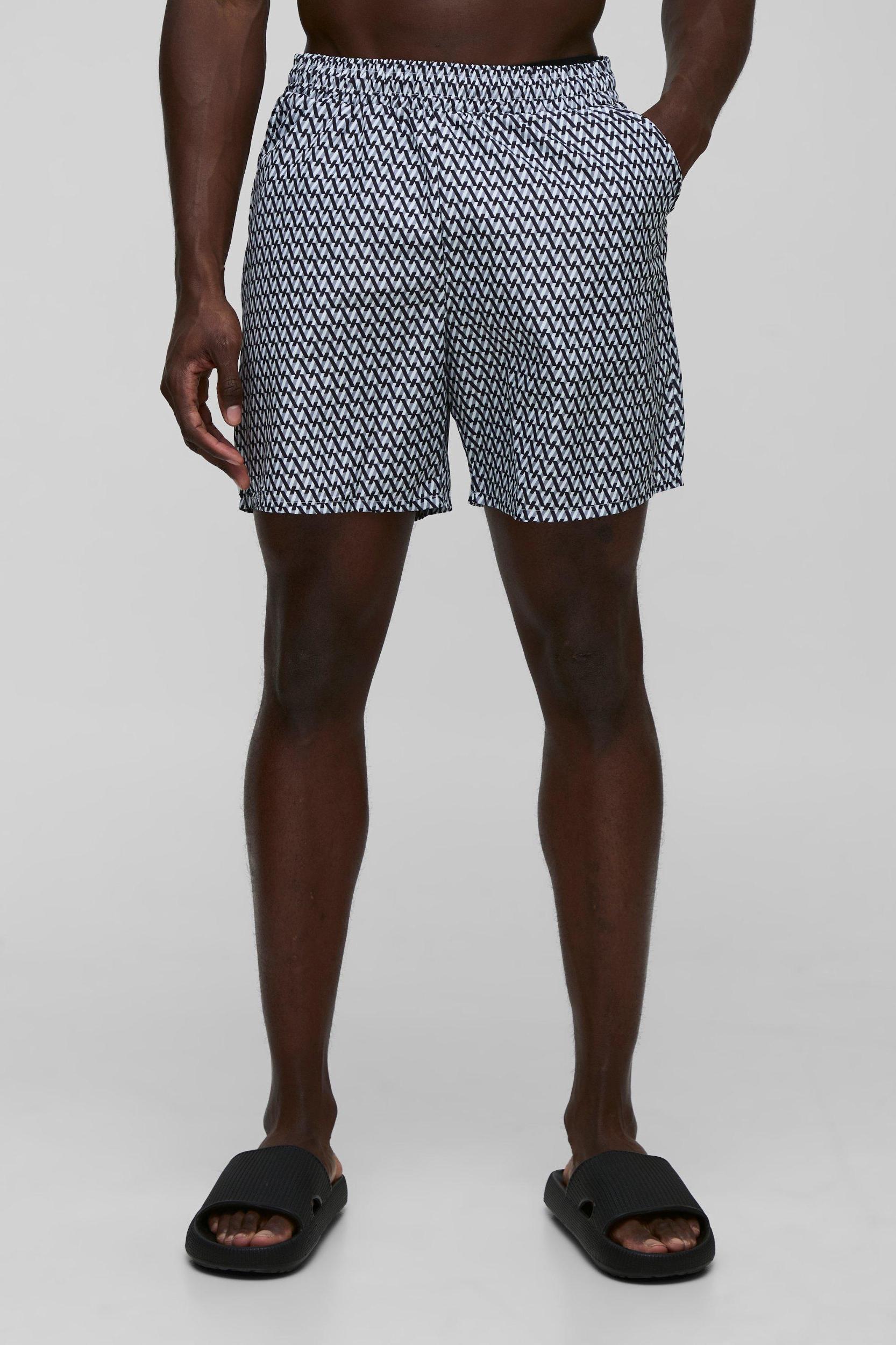 Abstract Printed Mid Length Swim Short | boohooMAN USA Product Image