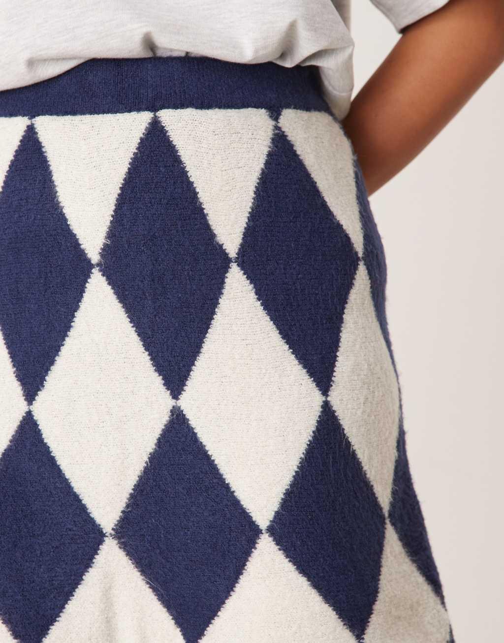 Neon Rose argyle knit mini skirt in navy Product Image