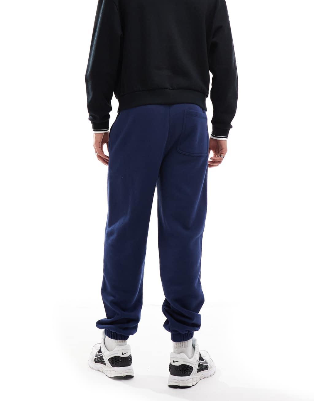 Cotton On baggy cuffed track pant in indigo Product Image