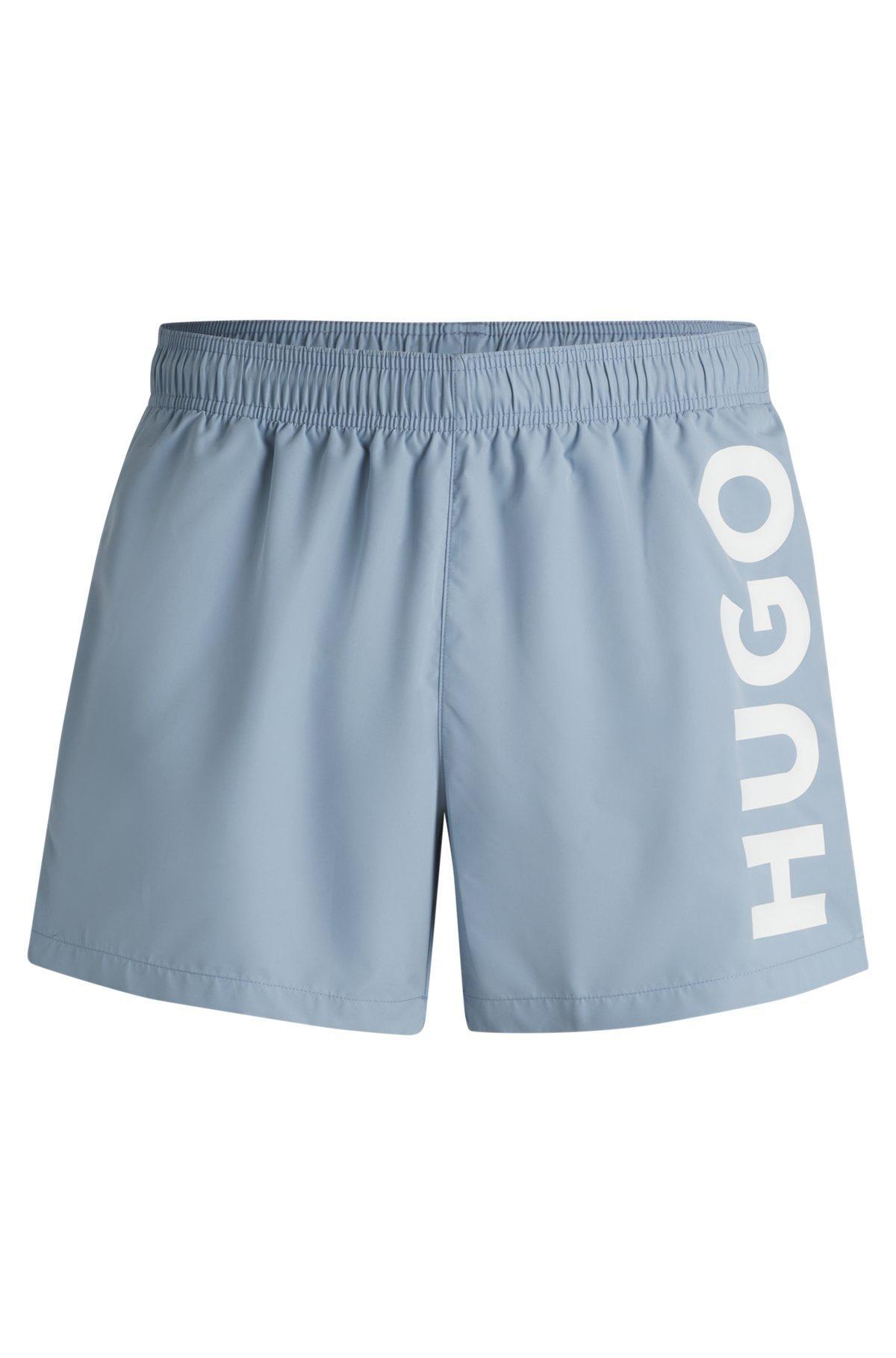 HUGO - Quick-dry swim shorts with vertical logo print - Light Blue Product Image