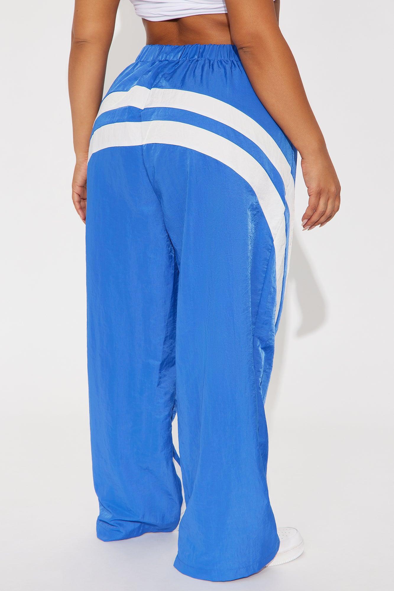 Follow The Curve Windbreaker Track Pant - Blue Product Image