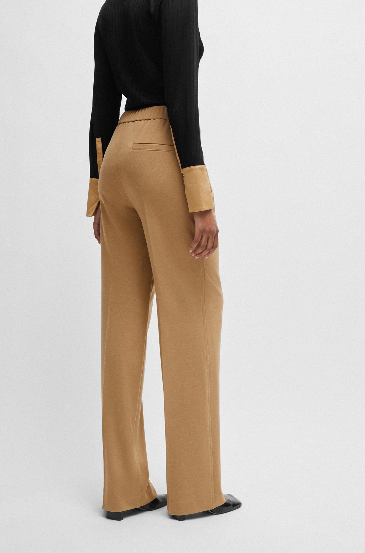 Relaxed-fit trousers with bootcut leg in stretch material Product Image