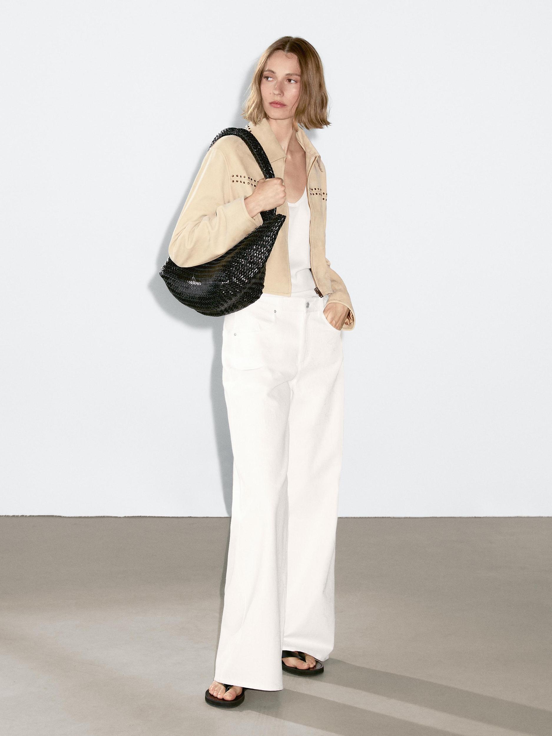 Short leather jacket with stud details Product Image