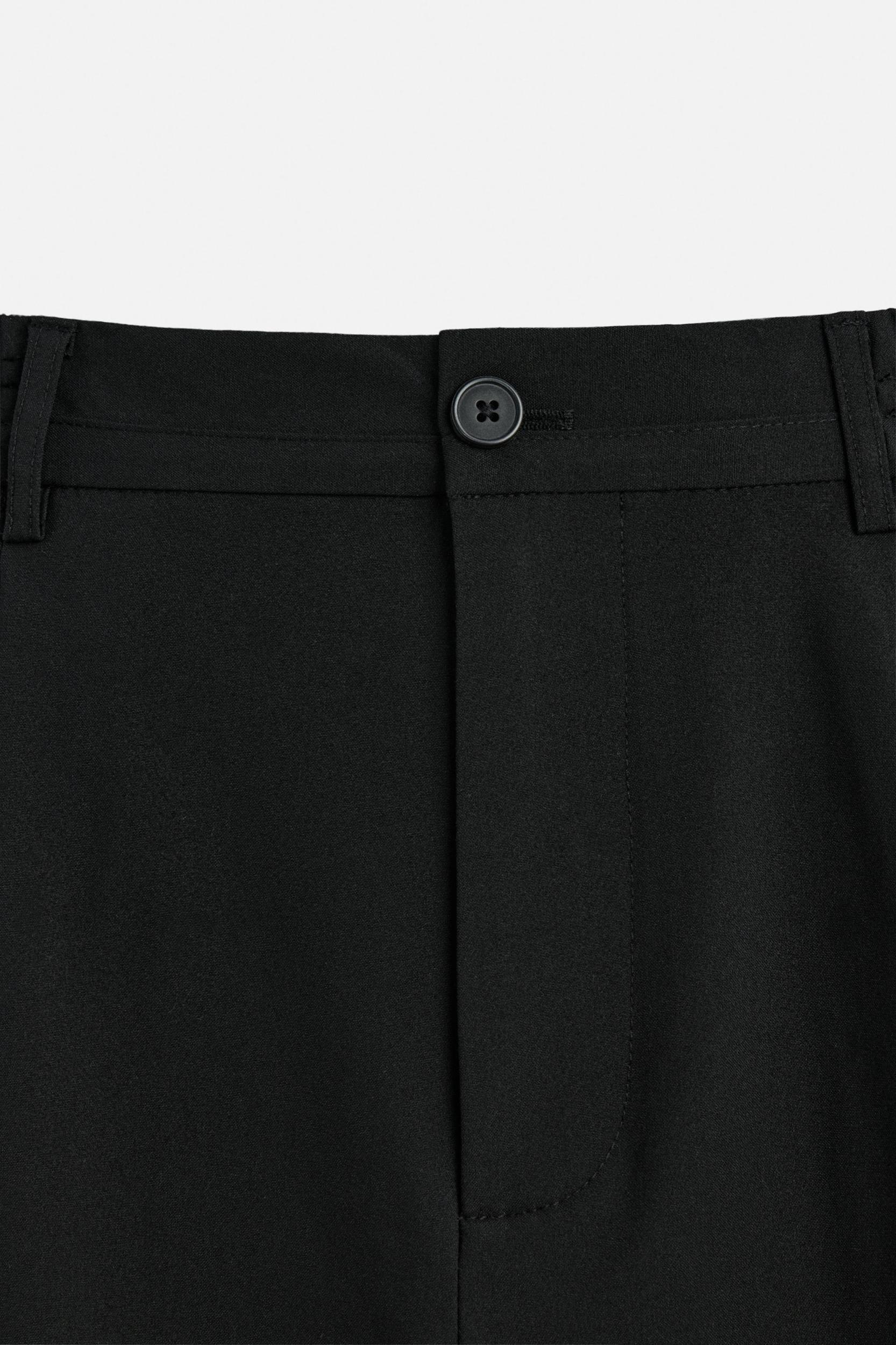 PLEATED WIDE FIT PANTS Product Image