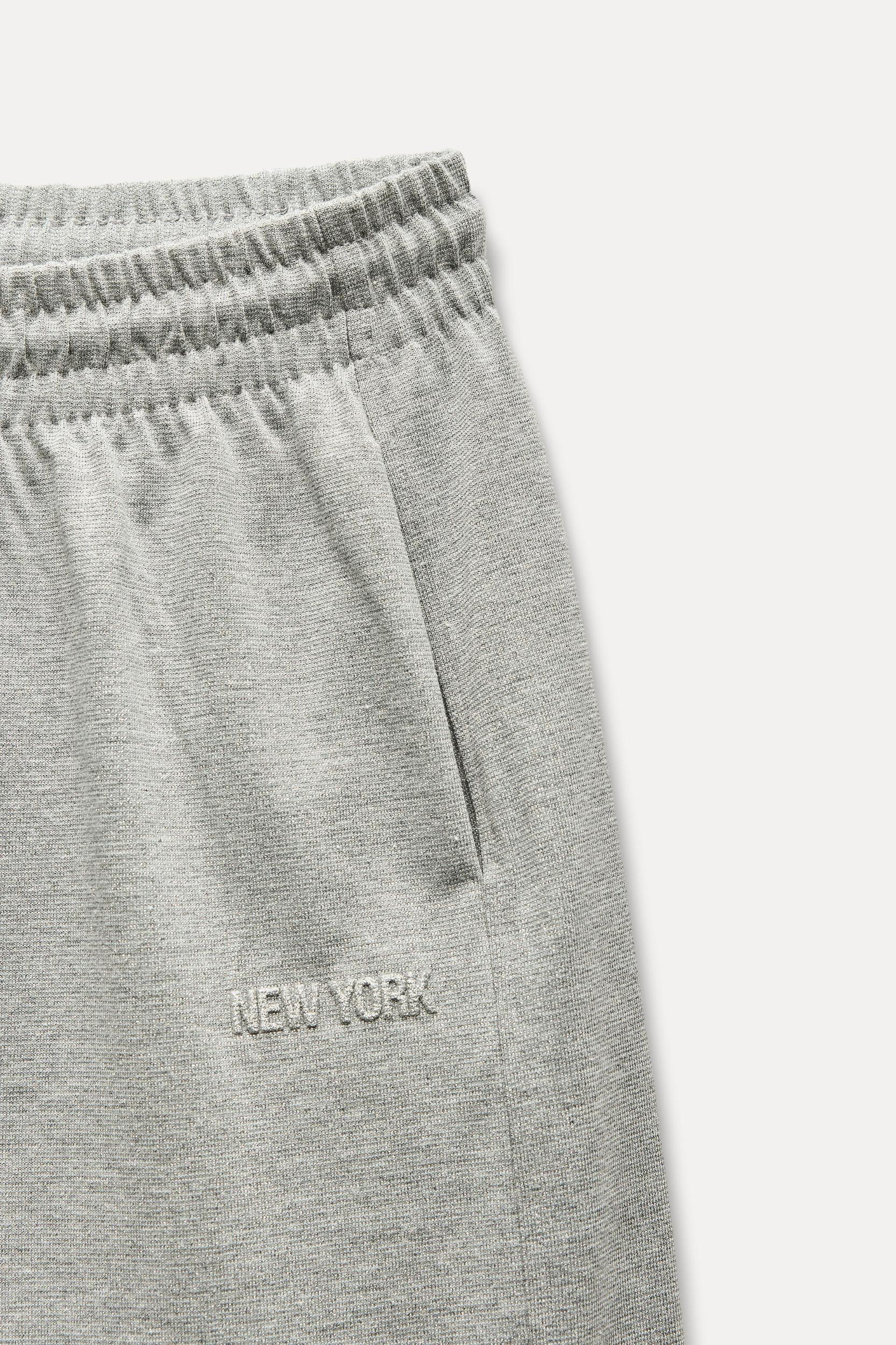 METALLIC THREAD TEXT PANTS Product Image
