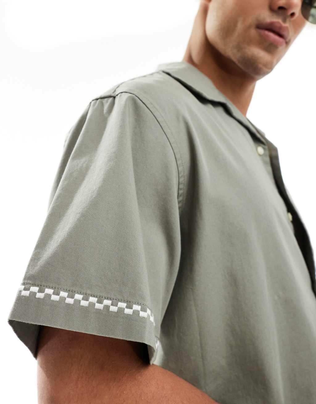 Selected Homme revere collar shirt with cream floral print in olive green Product Image