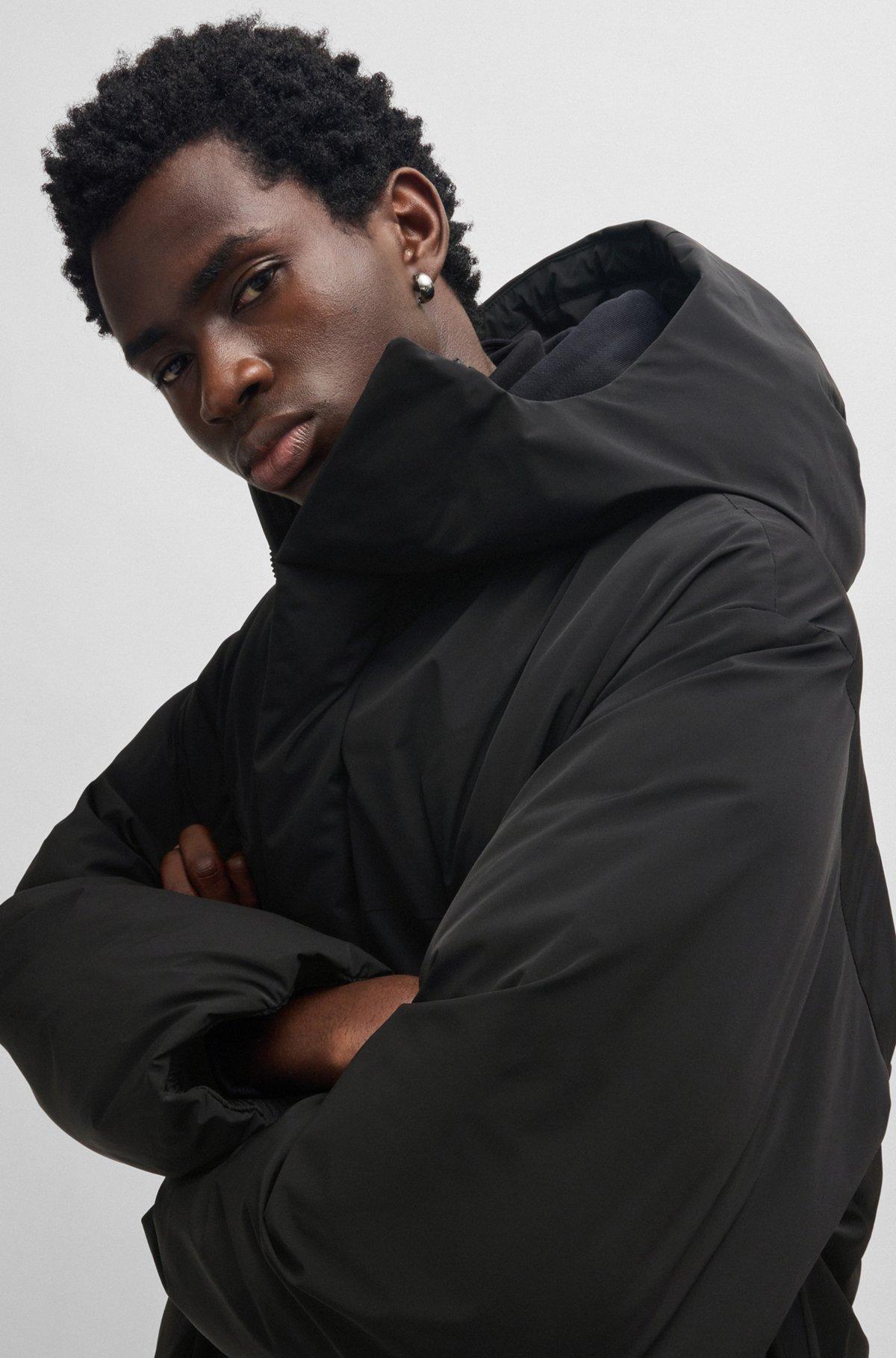 Water-repellent parka jacket in superblack fabric Product Image