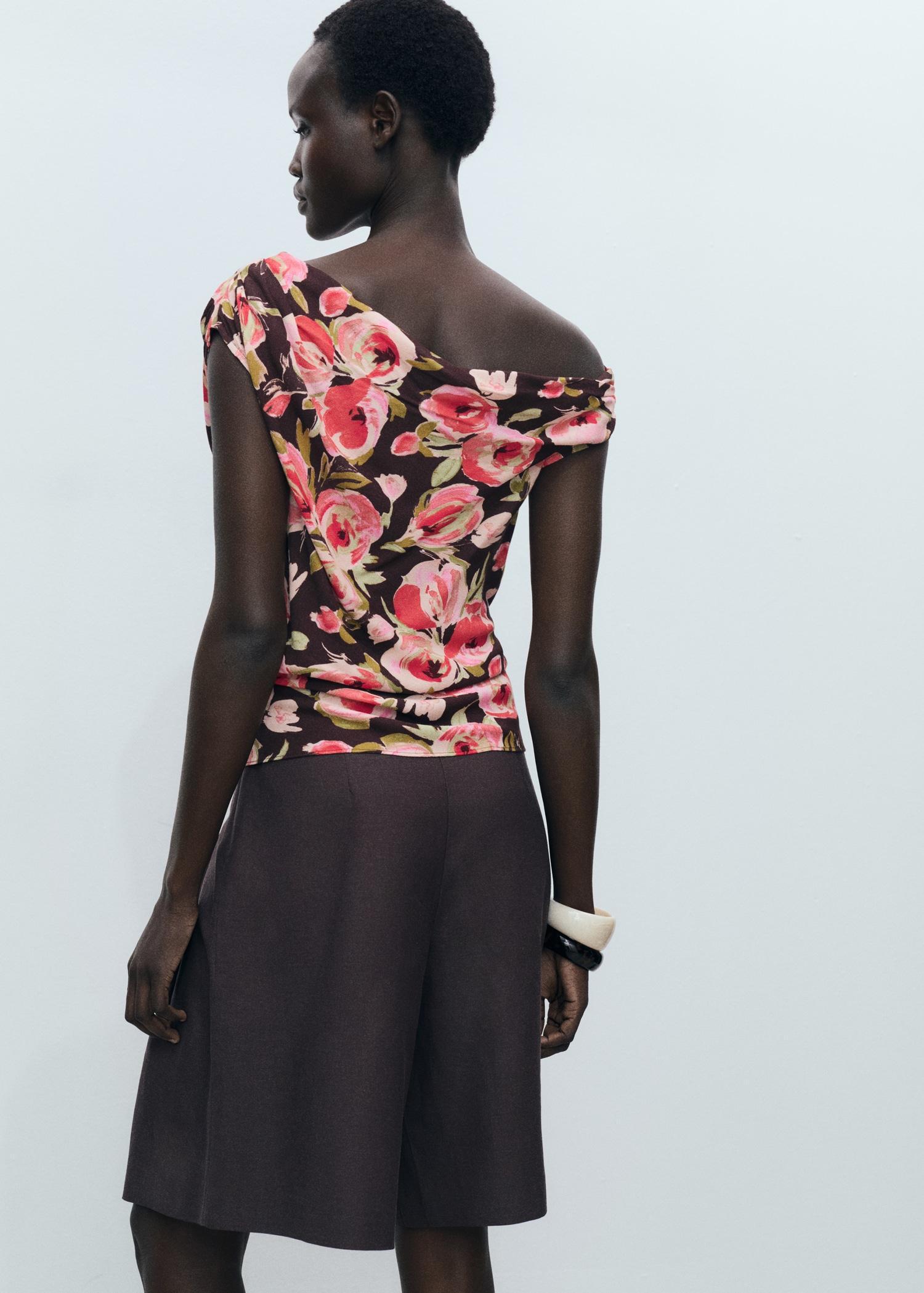 Floral blouse with asymmetrical neck - Women | MANGO USA Product Image