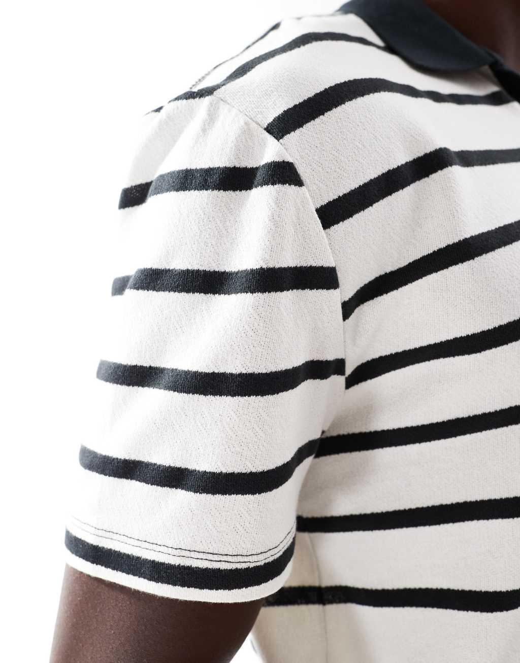ASOS DESIGN relaxed fit polo in black and white stripe Product Image