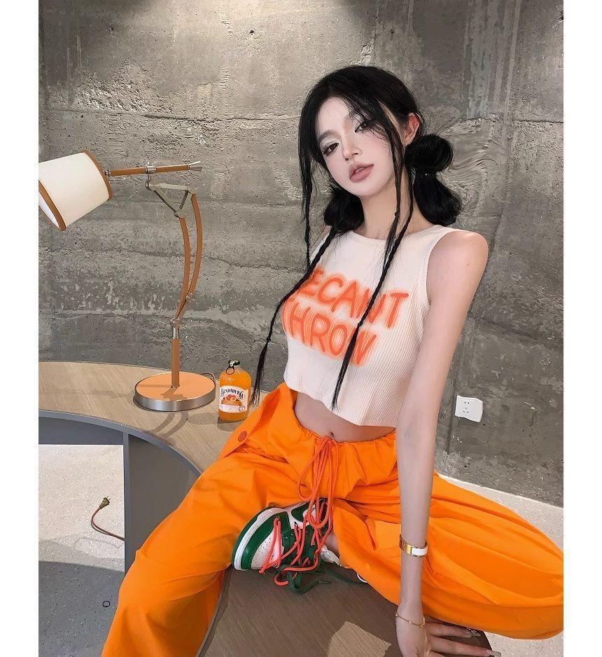 Round Neck Lettering Print Crop Tank Top / Drawstring Waist Plain Wide Leg Cargo Pants Product Image
