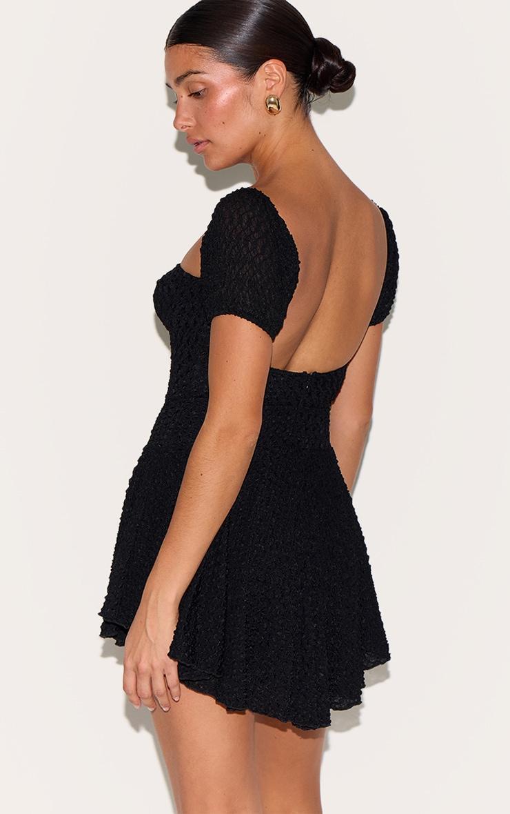Petite Black Textured Bardot Puff Sleeve Mini Dress Product Image