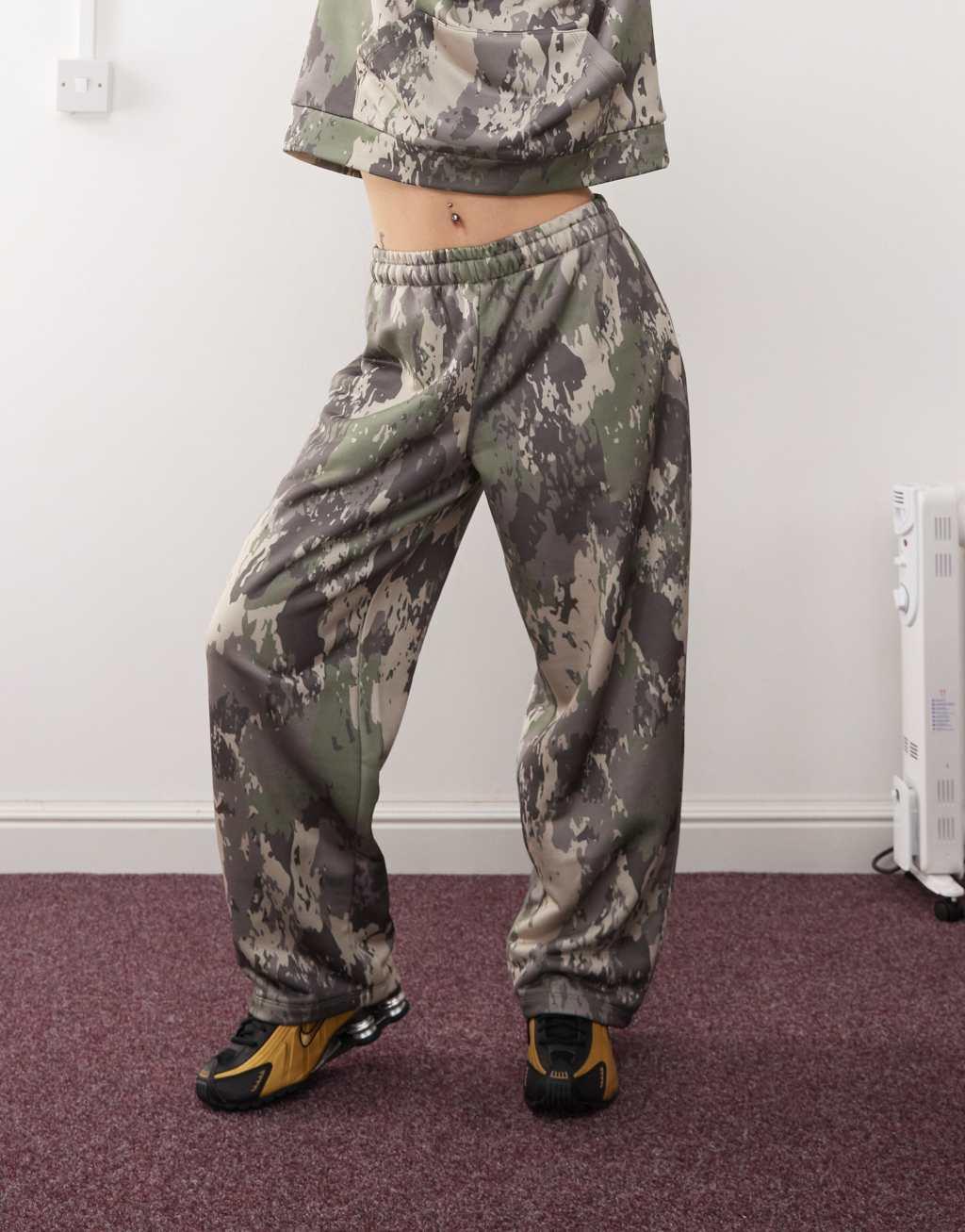 COLLUSION relaxed sweatpants in green camo Product Image