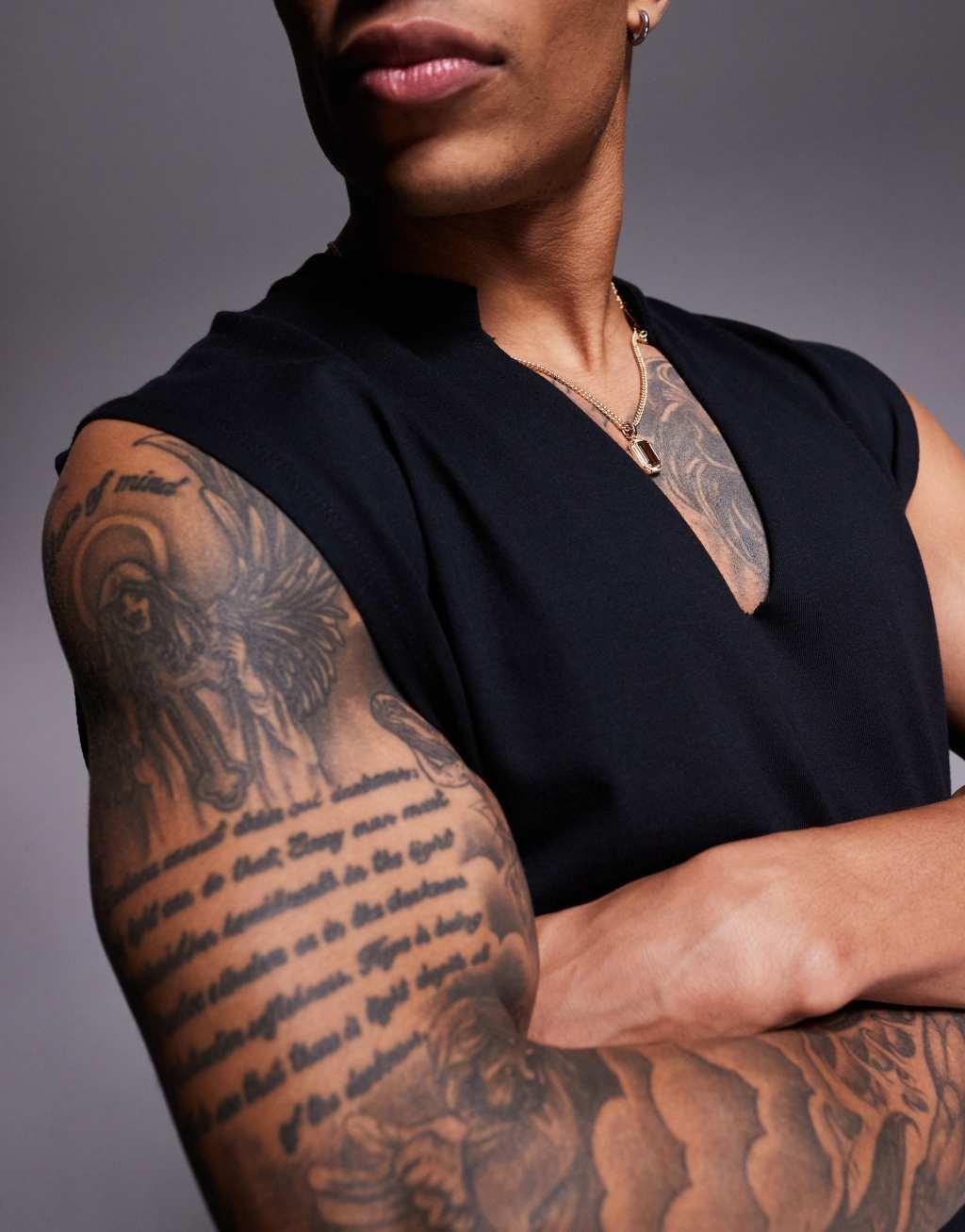 ASOS DESIGN oversized tank top with v-neck in black Product Image