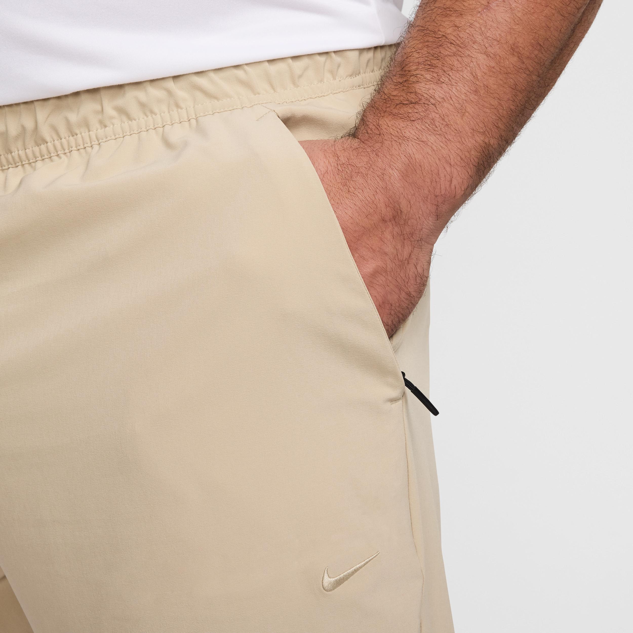 Nike Men's Unlimited Dri-FIT Zippered Cuff Versatile Pants Product Image
