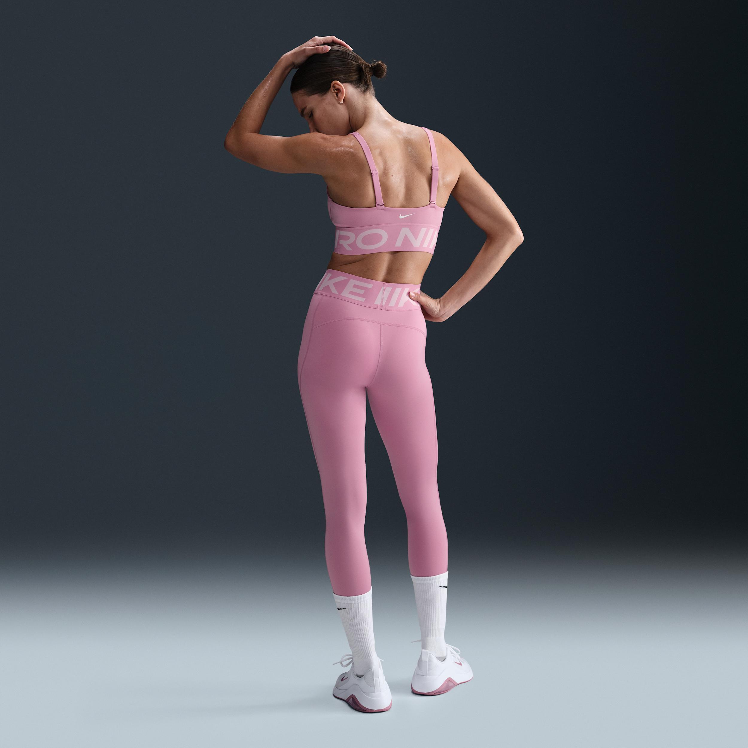 Nike Women's Pro Indy Plunge Sports Bra in Pink/Elemental Pink Size Medium Polyester/Spandex Product Image