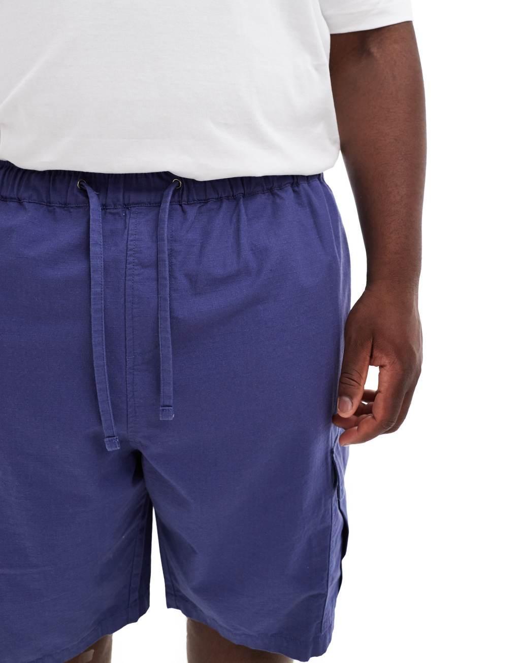 ASOS DESIGN cargo shorts in blue Product Image