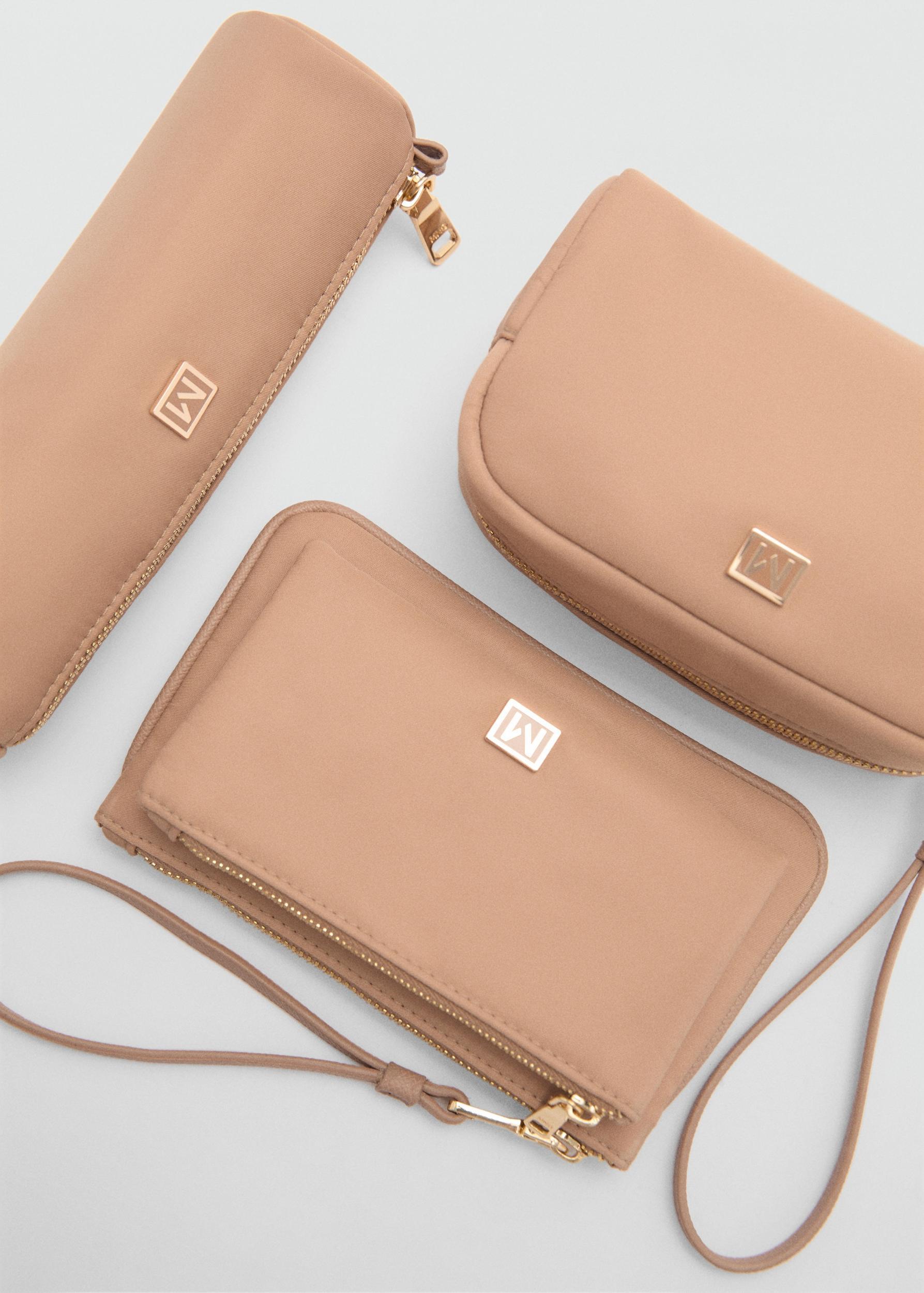 Zipped toiletry bag with logo - Women | MANGO USA Product Image