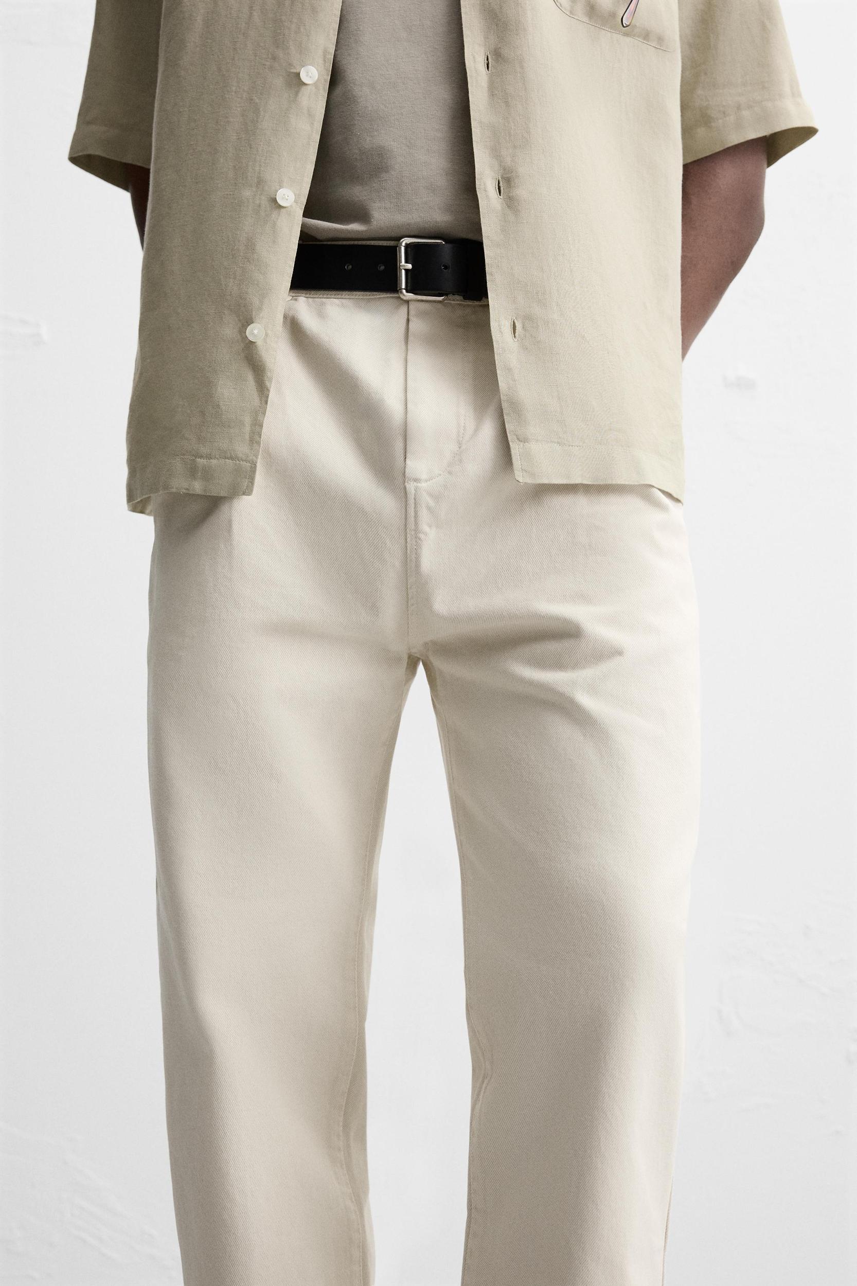 PLEATED STRAIGHT FIT PANTS Product Image