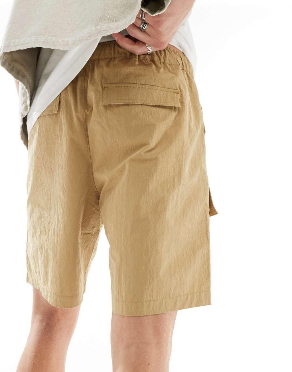 ASOS DESIGN cargo nylon shorts in beige Product Image