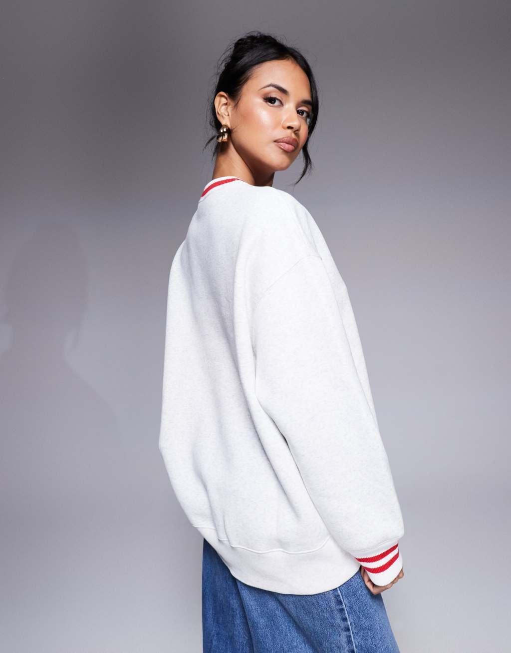 Nike Phoenix Fleece oversized sweatshirt in gray and red Product Image