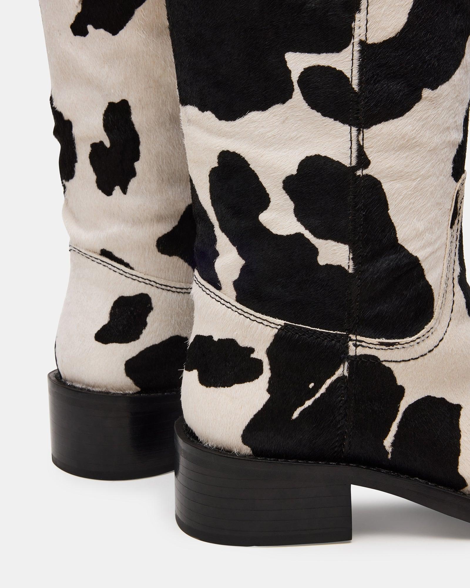 RIGGS BLACK COW PRINT WIDE CALF Female Product Image