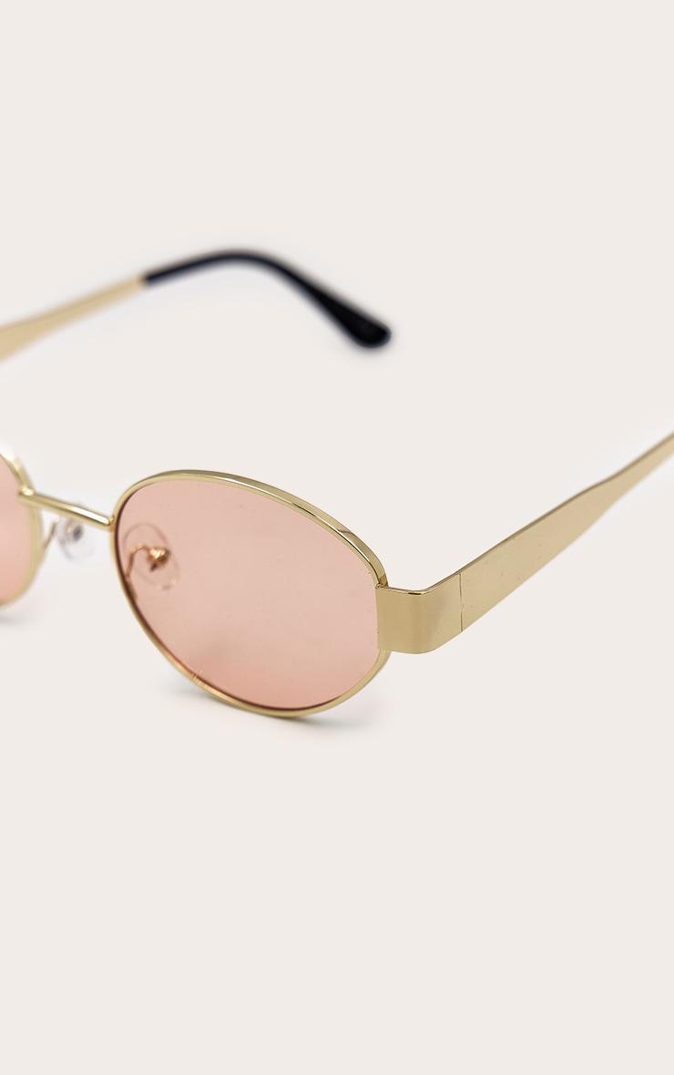 Gold Metal Frame Peach Lens Round Sunglasses Product Image