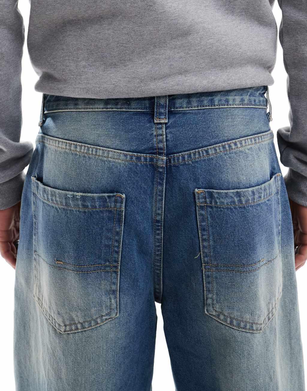 Bershka skater fit jeans in mid blue Product Image