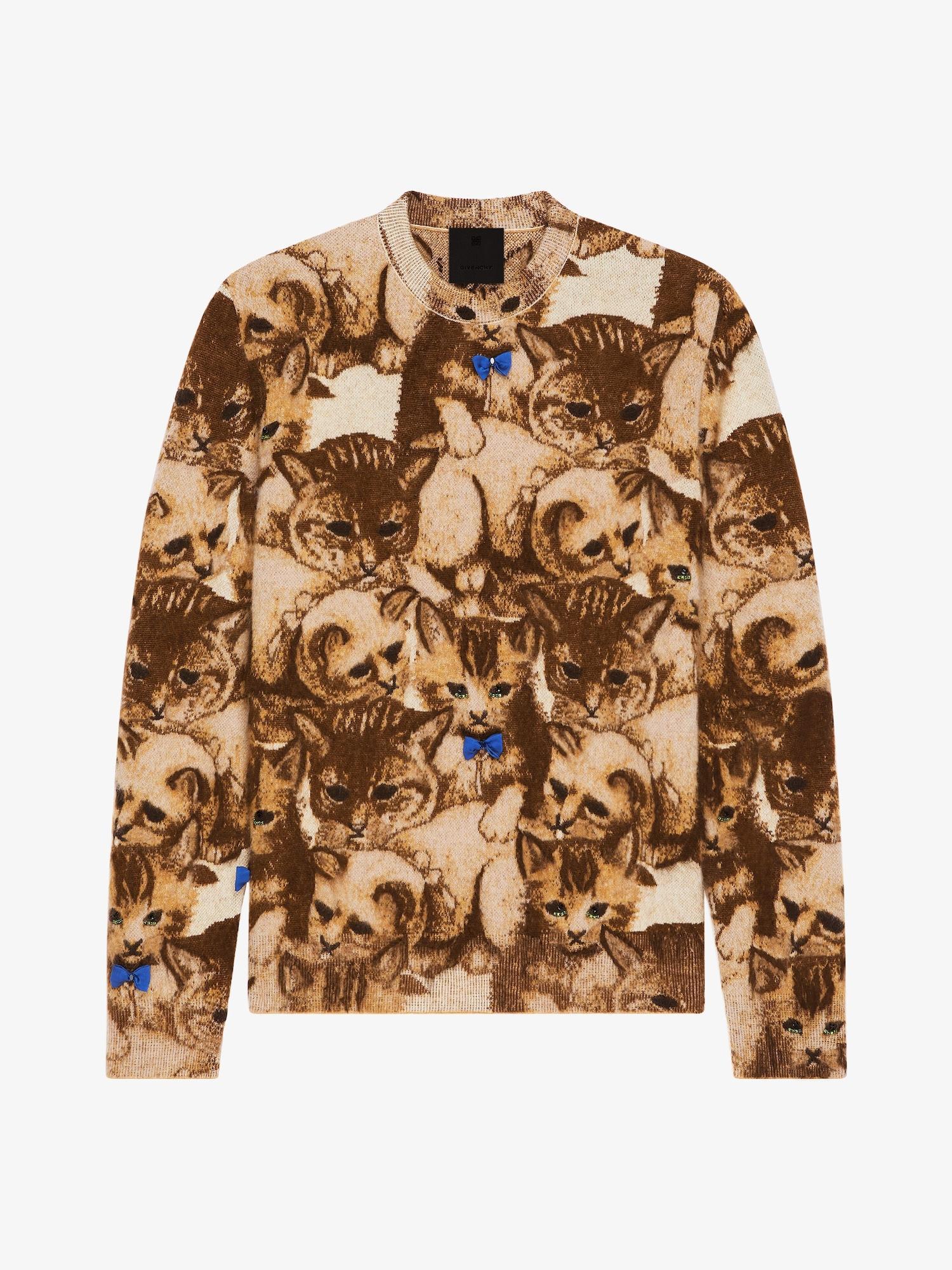 Sweater in cat jacquard with crystals details Product Image