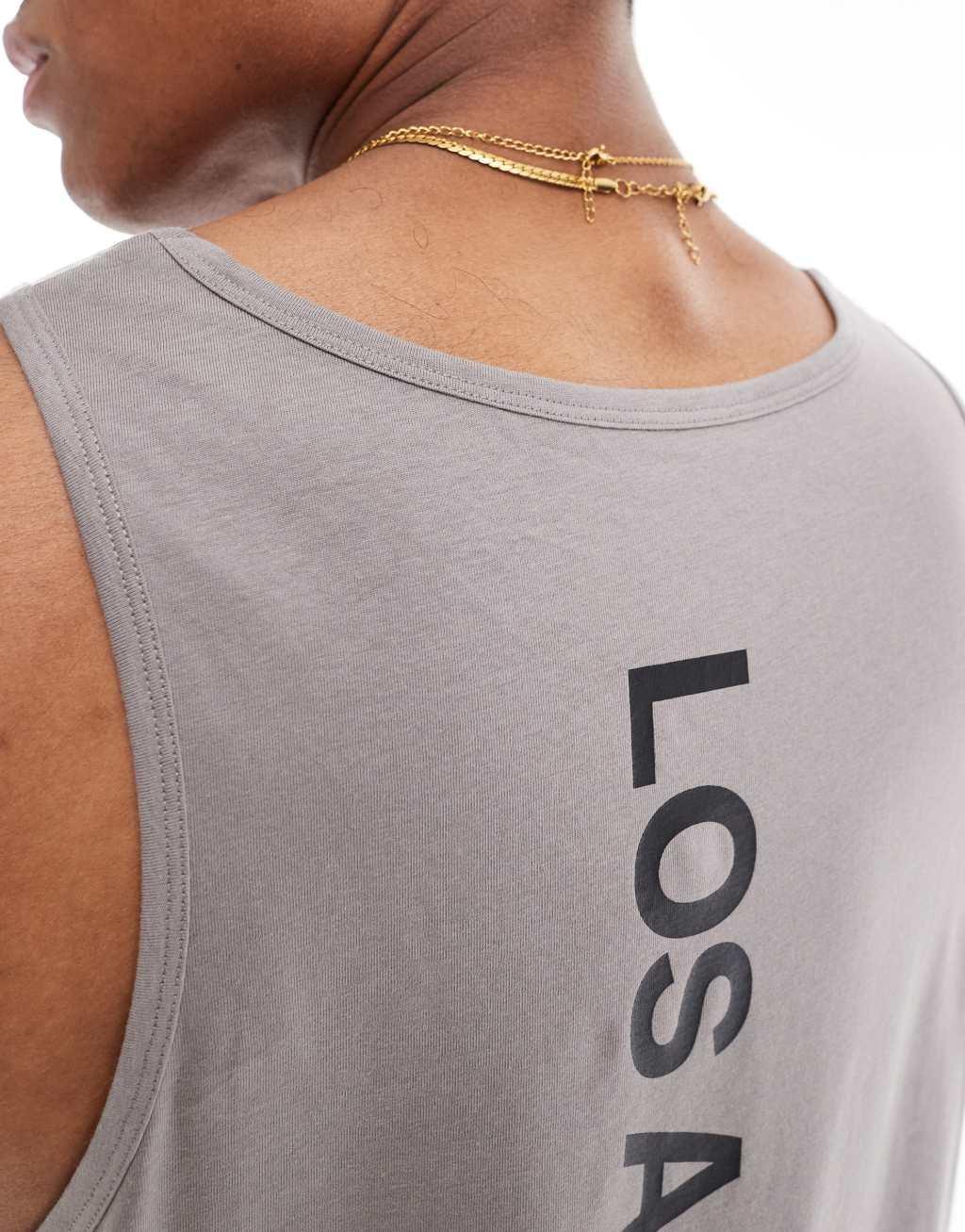 ASOS DESIGN relaxed tank top with scoop neck in gray with Los Angeles spine print  Product Image