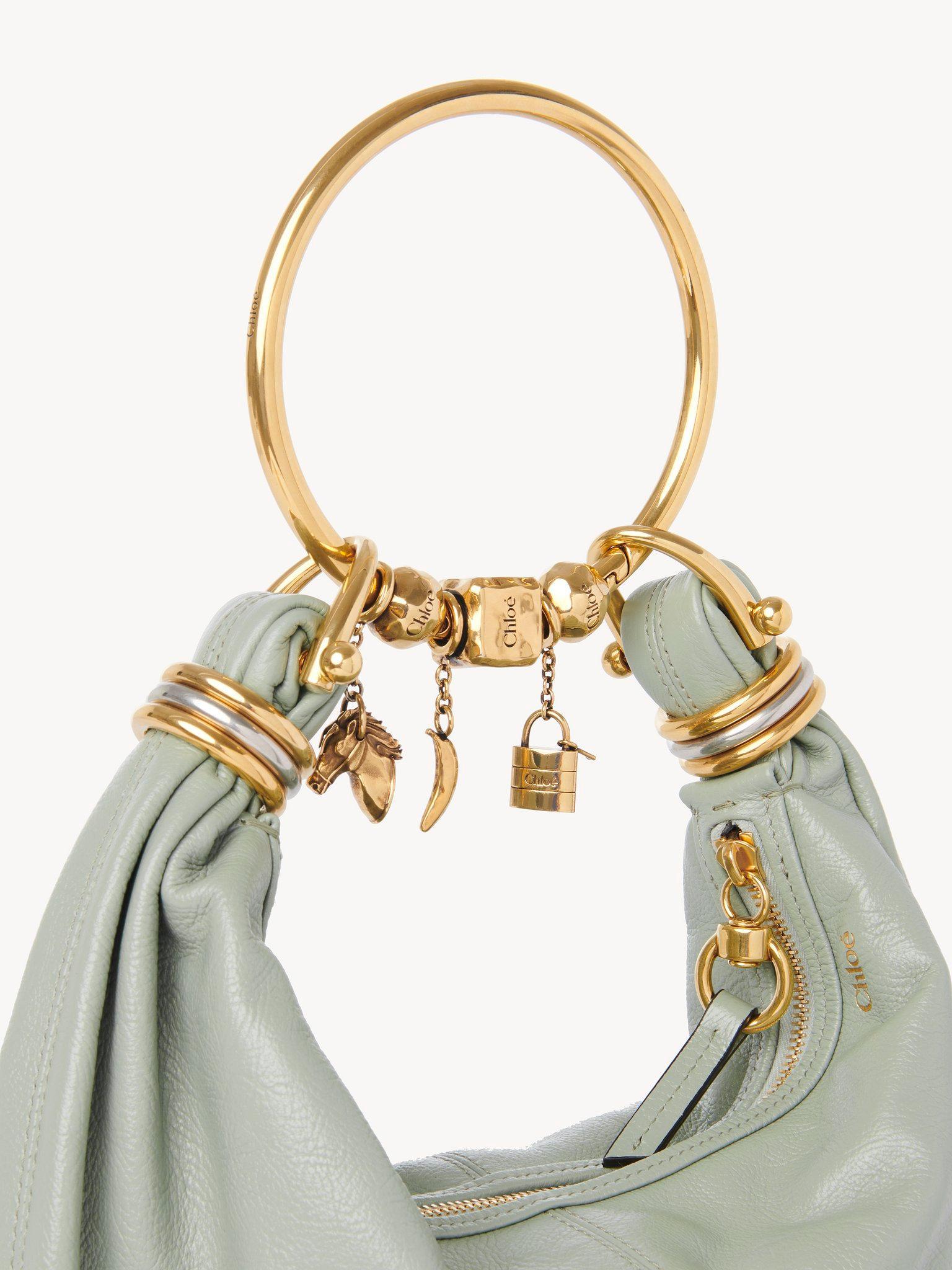 Small Bracelet hobo bag in grained leather Product Image