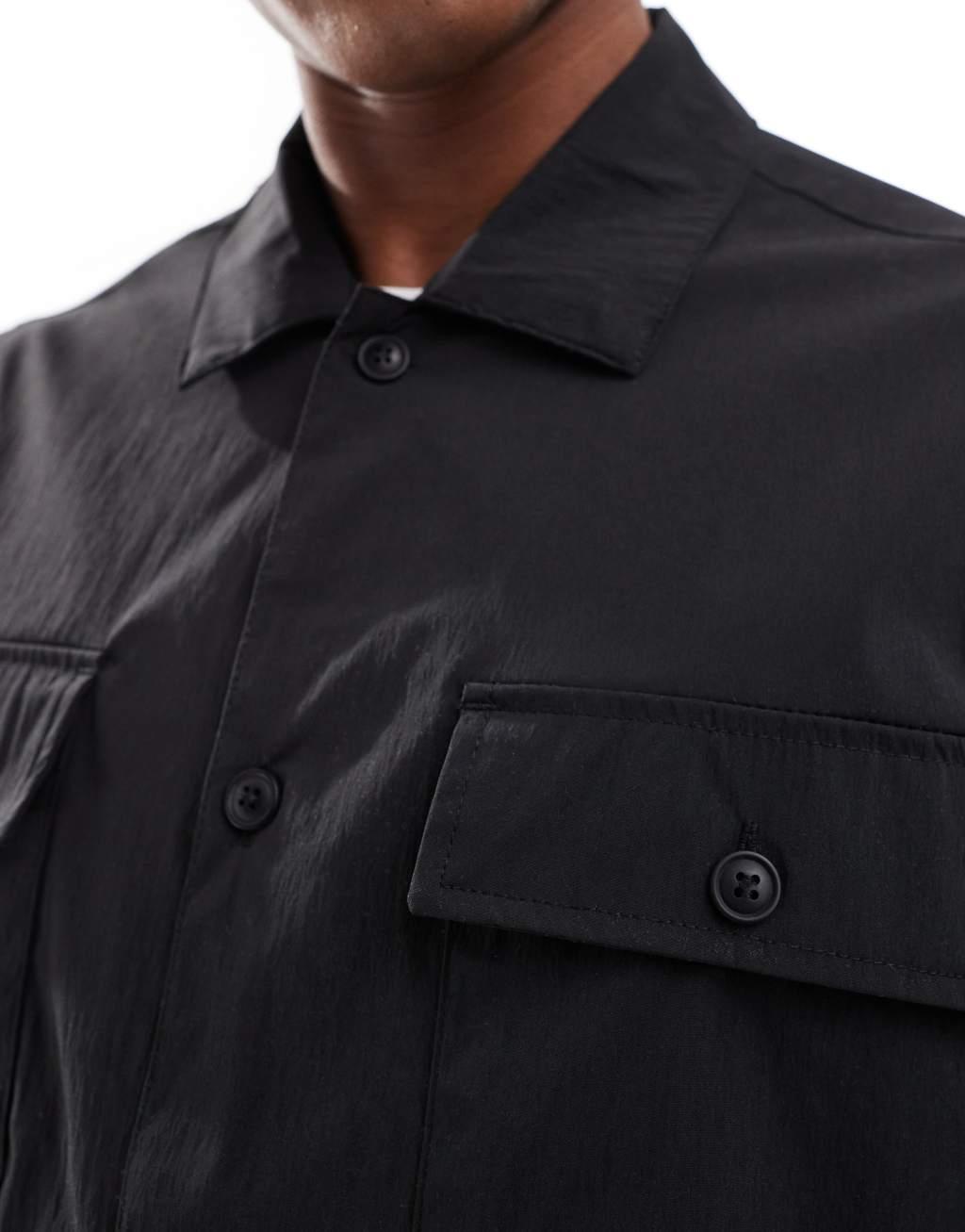 Jack & Jones oversized nylon overshirt in black Product Image
