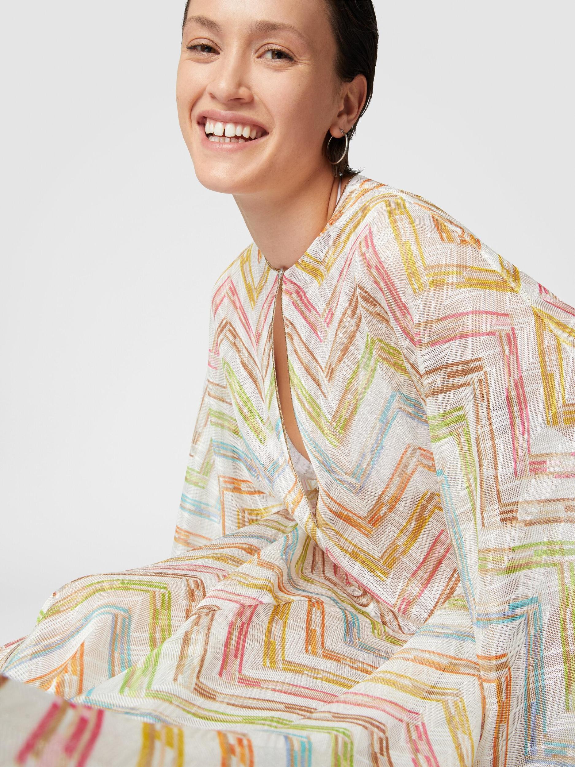 Long covered up in printed tulle with batwing sleeves Product Image