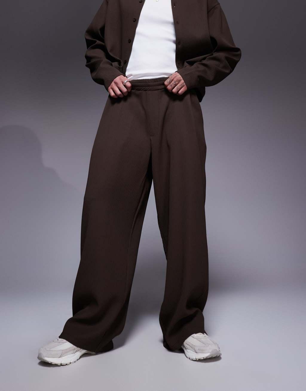 ASOS DESIGN super baggy plisse pants with elastic waist in brown - part of a set Product Image