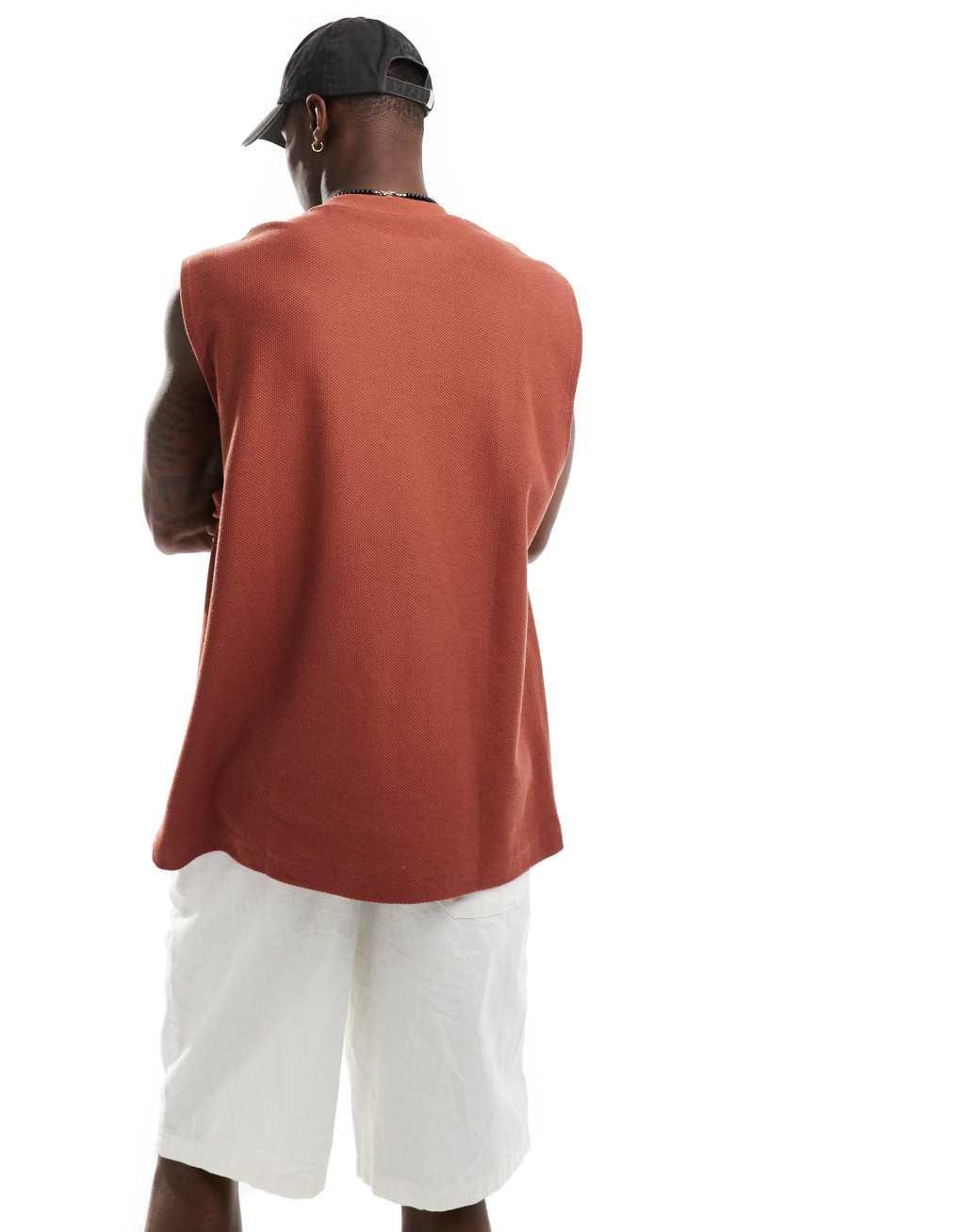 ASOS DESIGN oversized tank with front pocket in red Product Image